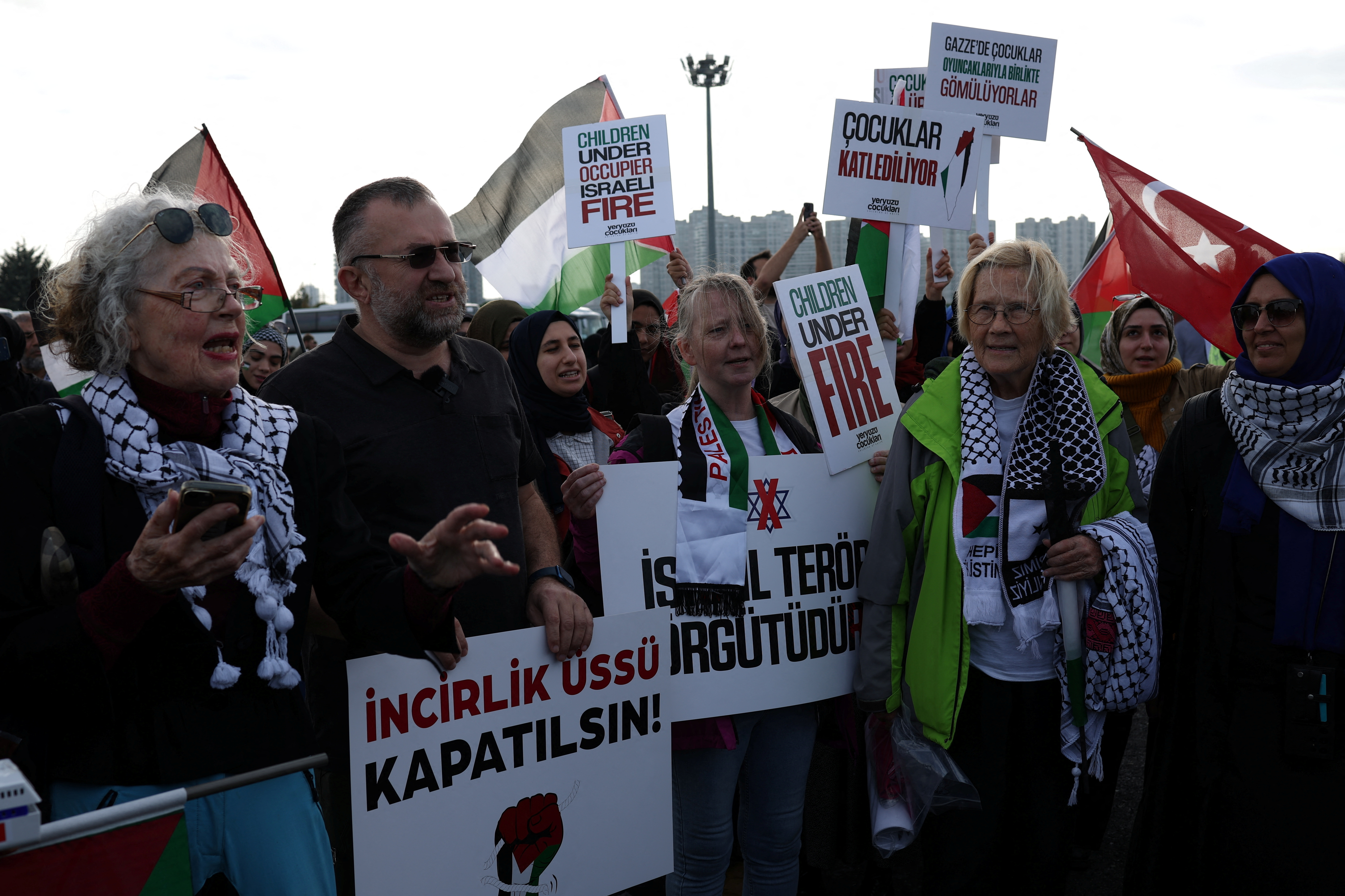International peace activists Wendy Goldsmith from Canada and Gerd von der Lippe from Norway join the convoy in Istanbul, Turkey, on November 3, 2023. [REUTERS/Murad Sezer]