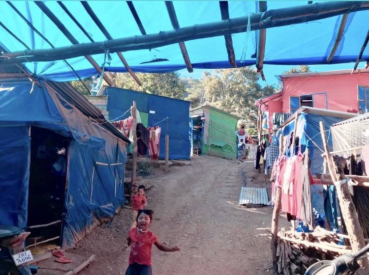 People at refugee camps in the village of Zokhawthar, India, near the Myanmar border, are keen to get refugee identity documents