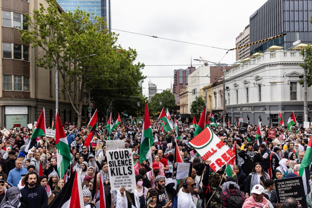 Pro-Palestinian demonstrators gather in front of the Victorian Parliament in Melbourne, Australia.