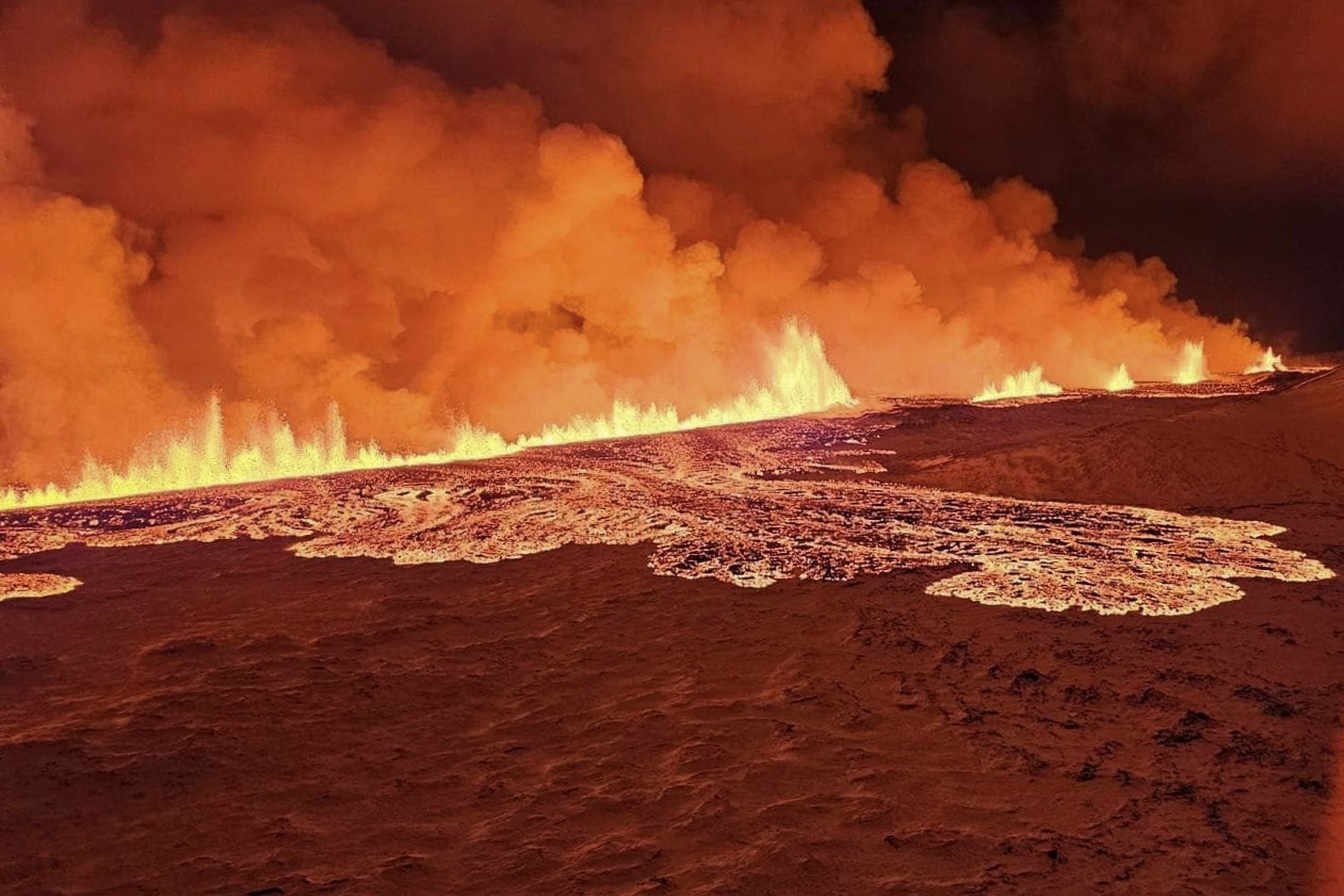 A volcano spews lava and smoke as it erupts in Grindavik, Iceland