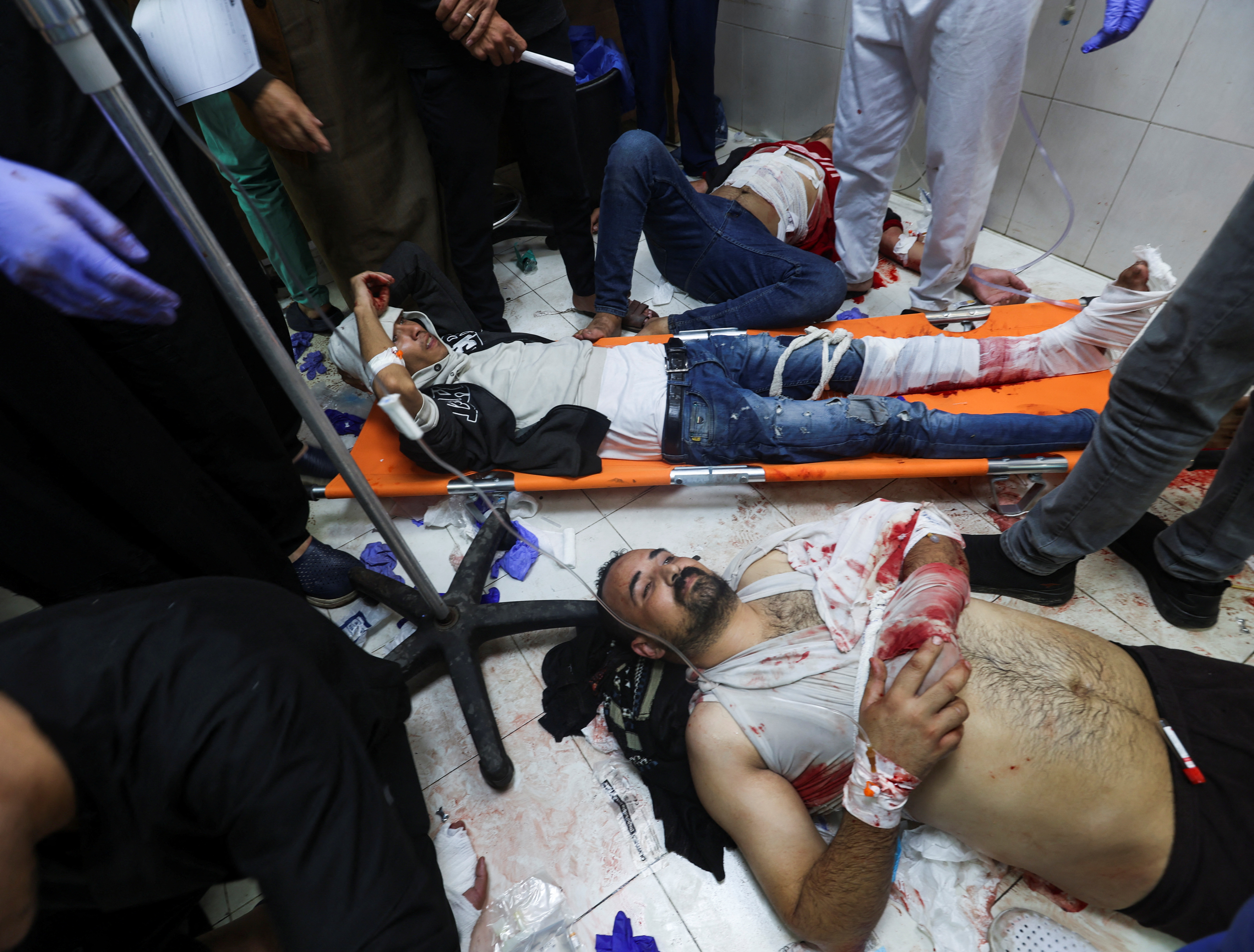 Wounded Palestinians are assisted at Nasser hospital,