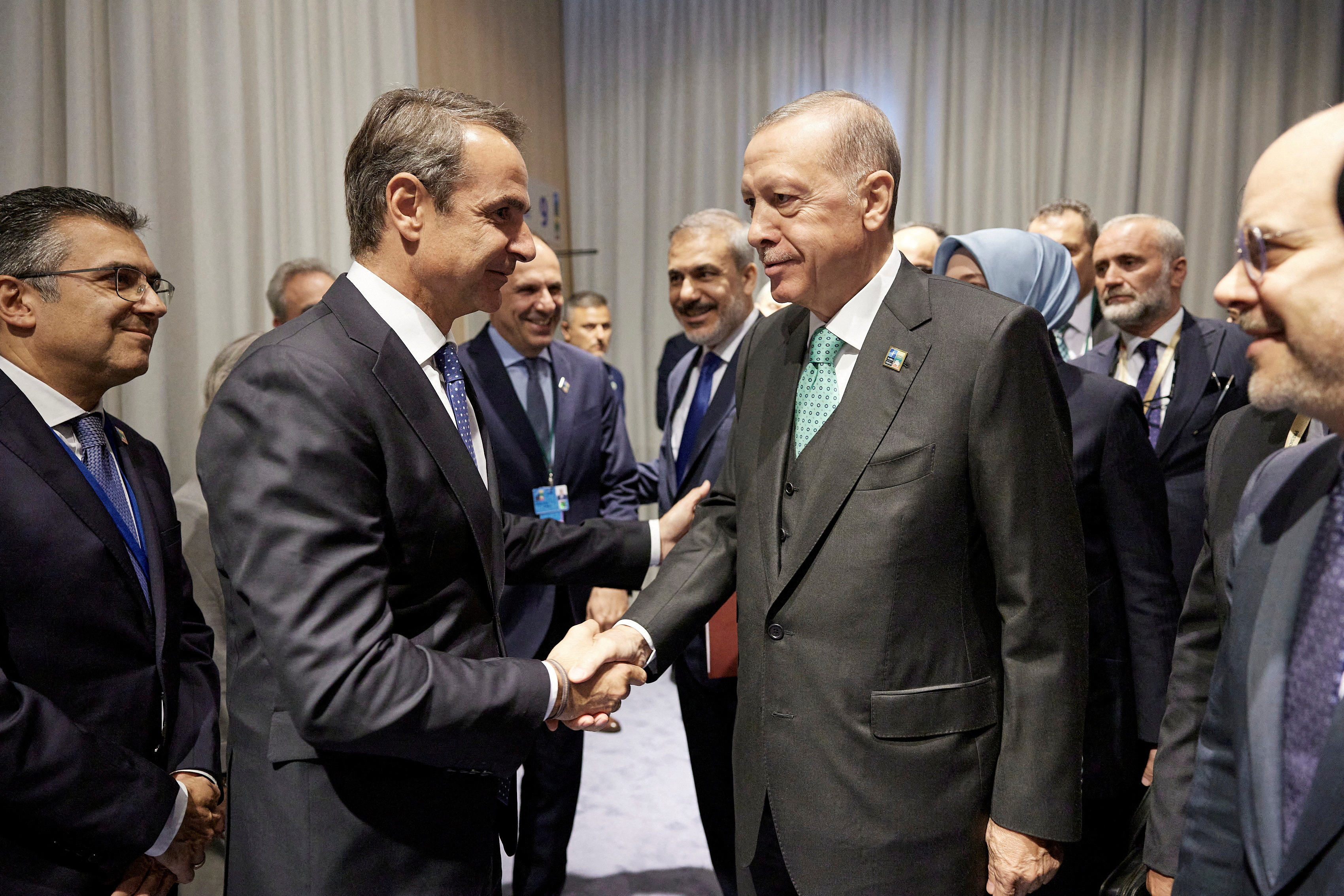 FILE PHOTO: Greece's Prime Minister Kyriakos Mitsotakis meets with Turkey's President Tayyip Erdogan during a NATO leaders summit in Vilnius, Lithuania July 12, 2023. Dimitris Papamitsos/Greek Prime Minister's Office/Handout via REUTERS ATTENTION EDITORS - THIS IMAGE HAS BEEN SUPPLIED BY A THIRD PARTY./File Photo