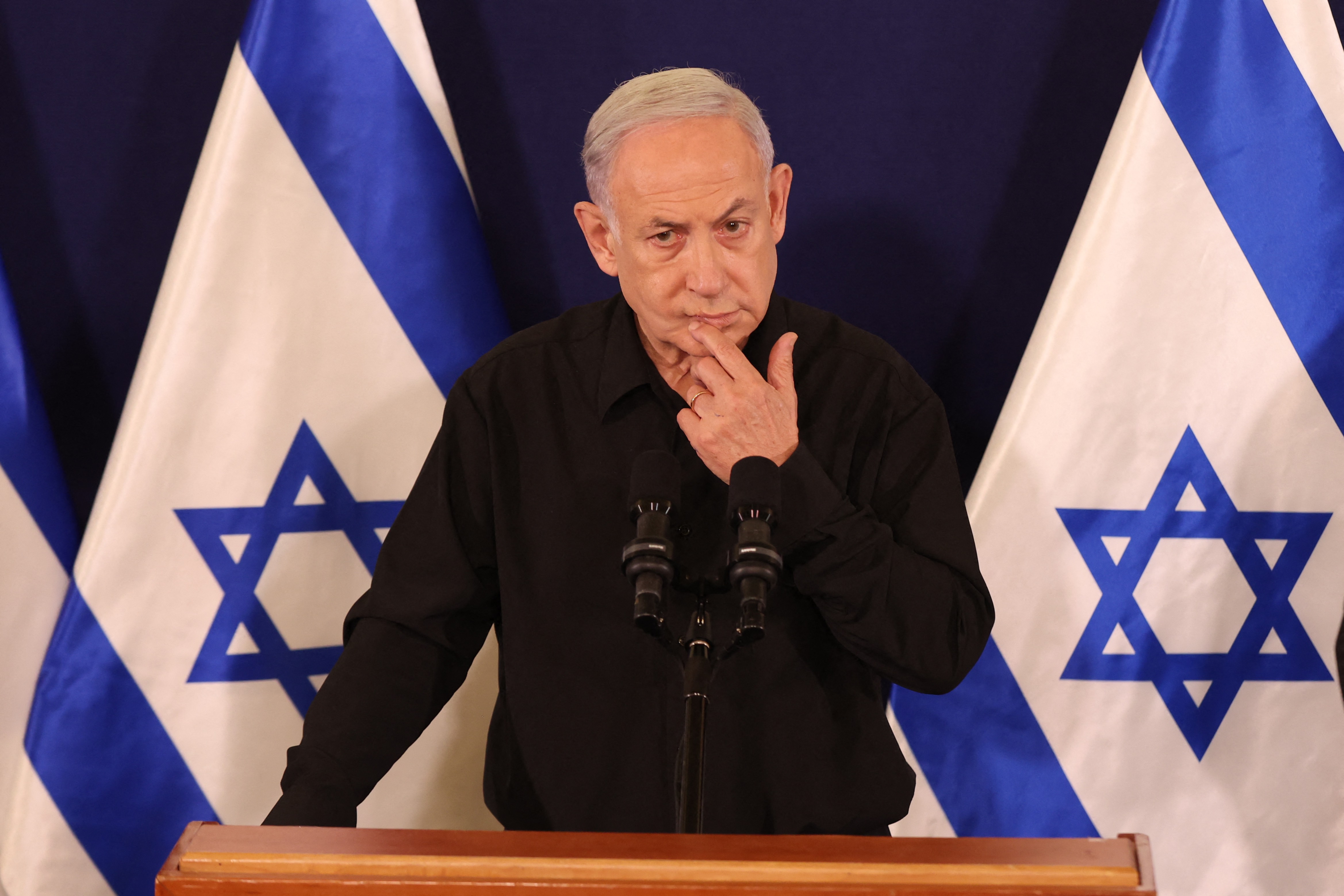 Israeli Prime Minister Benjamin Netanyahu speaks during a press conference in the Kirya military base in Tel Aviv on October 28, 2023.