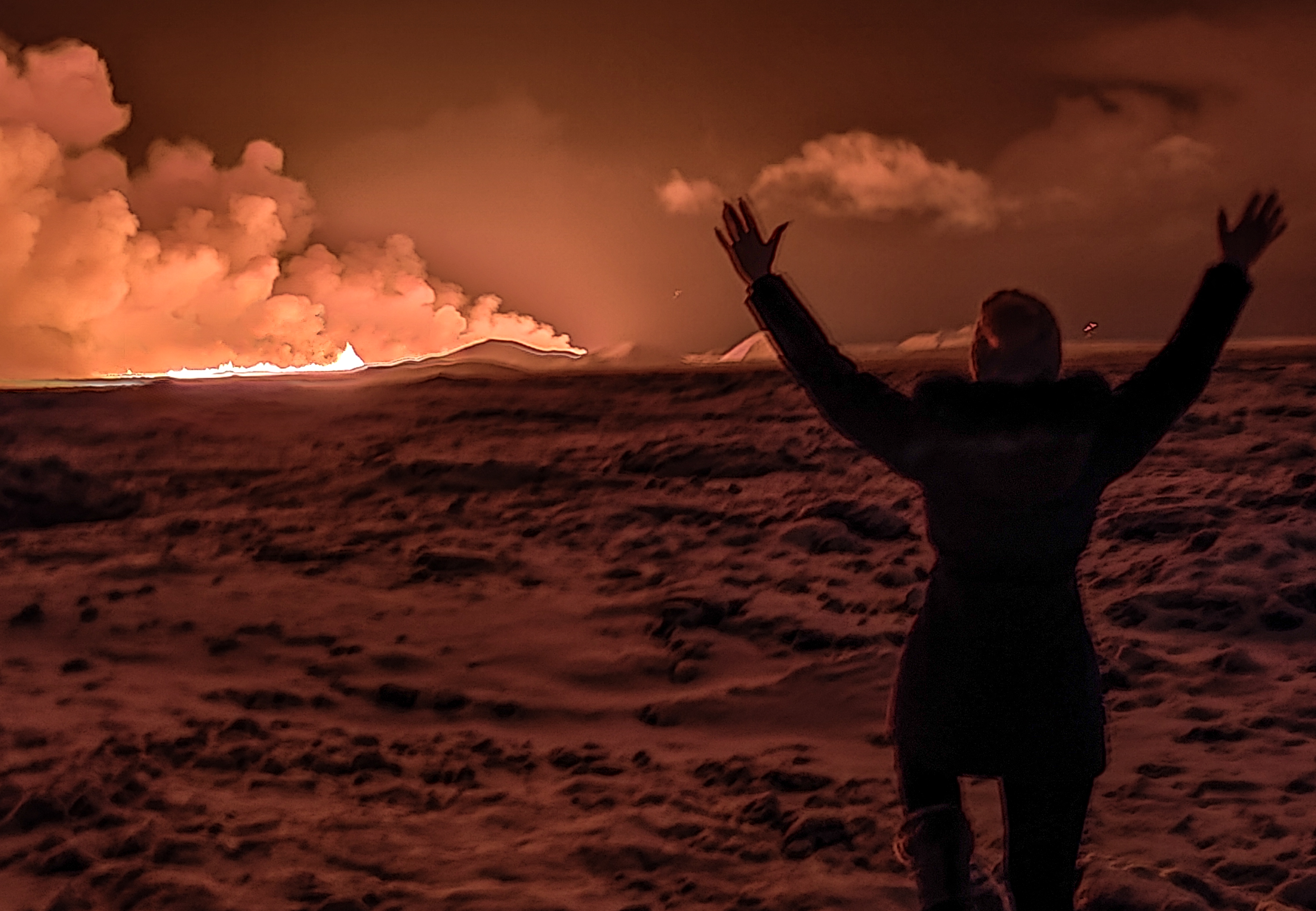 A volcano spews lava and smoke as it erupts in Grindavik, Iceland