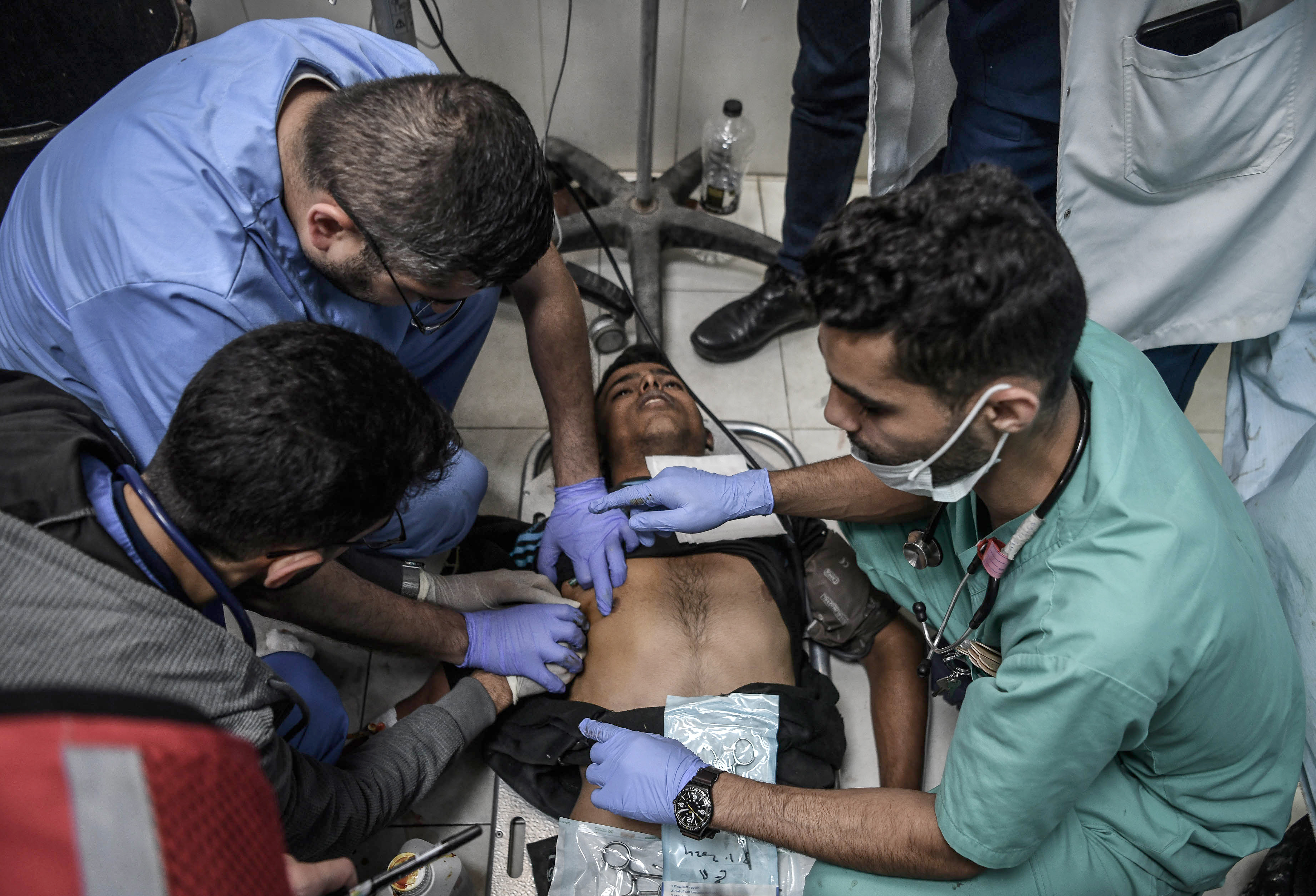 An injured Palestinian is taken to the Nasser Hospital for a treatment following the Israeli attacks in Khan Yunis, Gaza on December 4