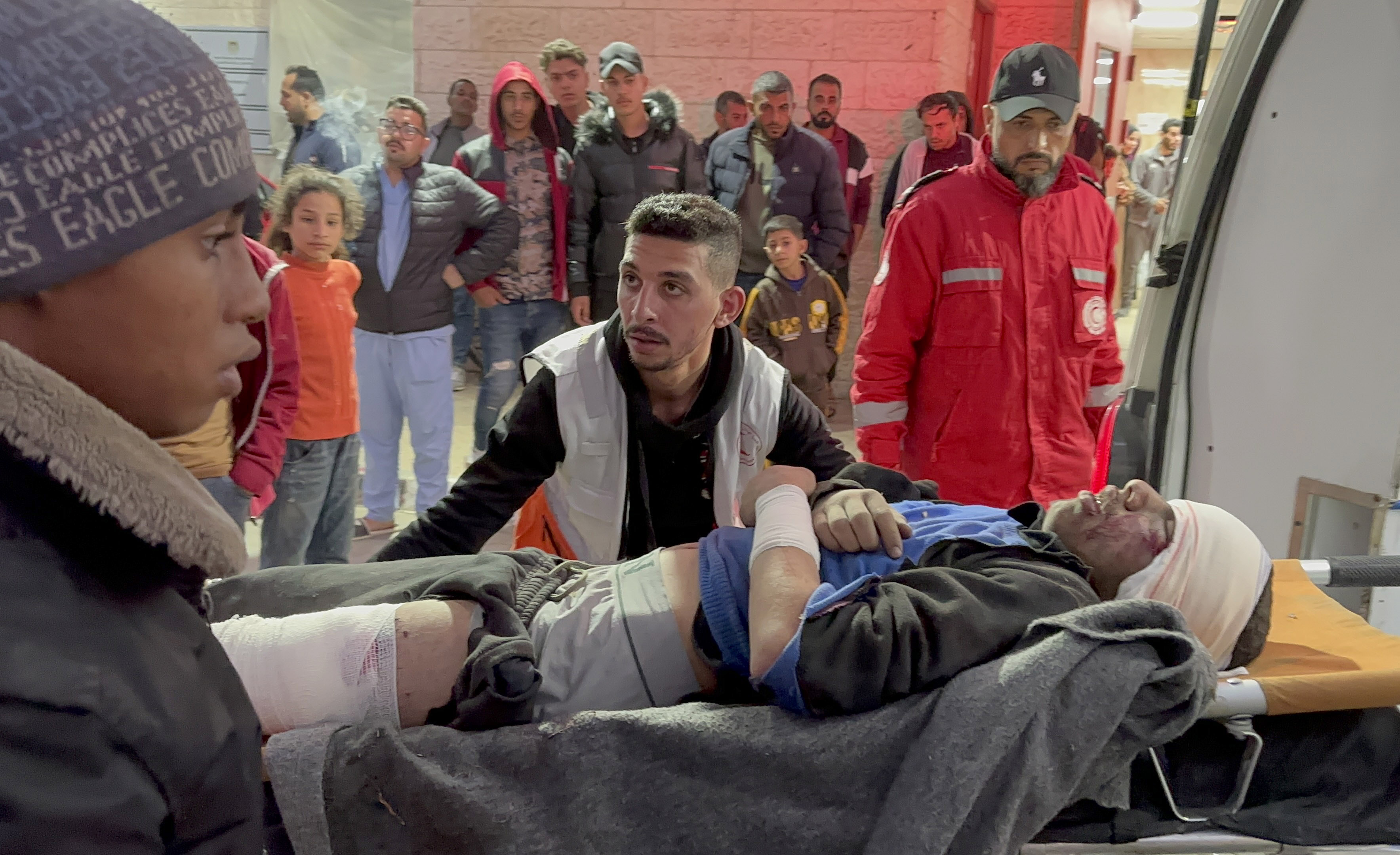 Injured Palestinians, including children, are brought to Al-Aqsa Martyrs Hospital for medical treatment following Israeli army hit Nasirat Refugee Camp in Deir al-Balah, Gaza.