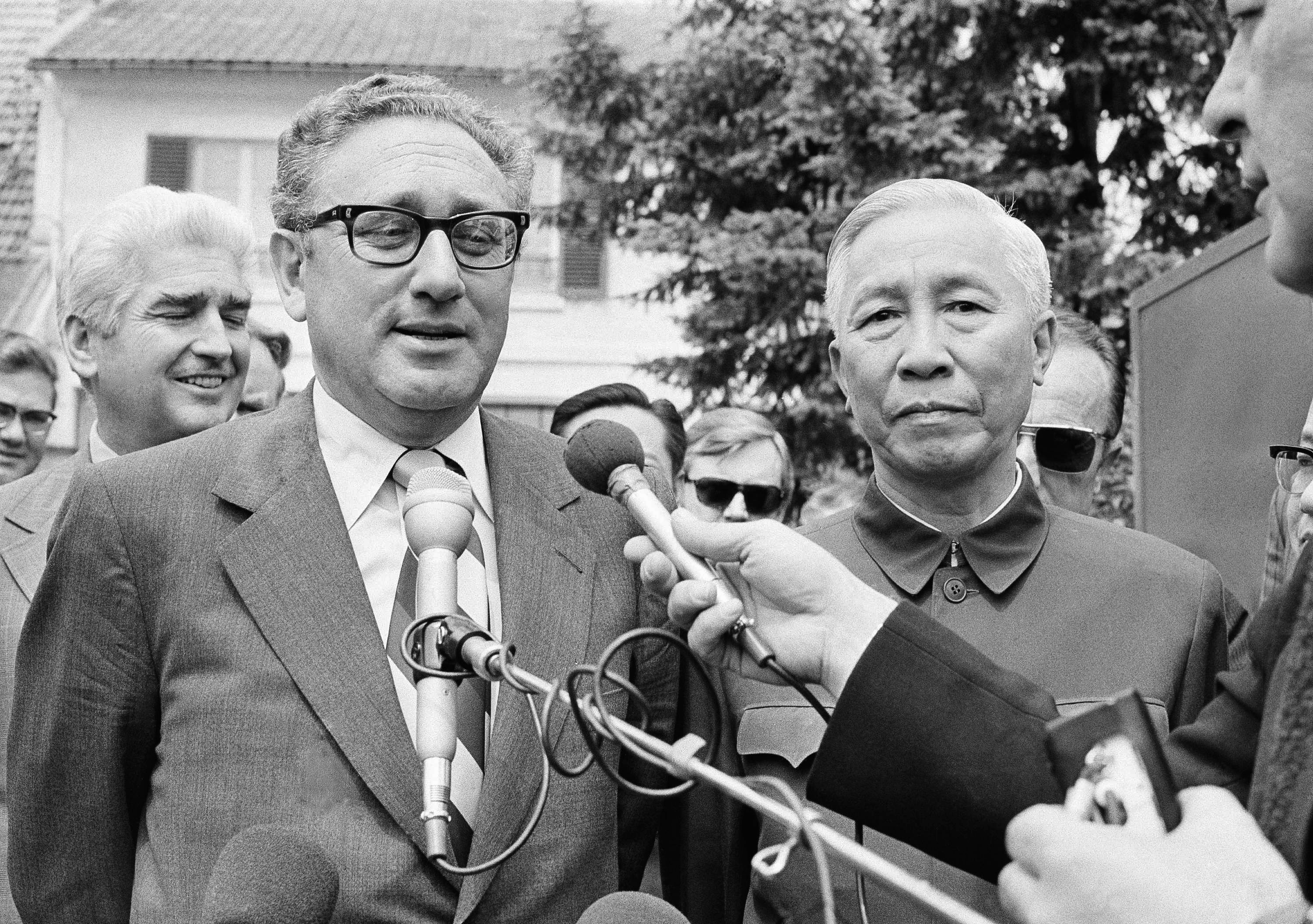 FILE - In this Wednesday June 13, 1973 file photo, President Nixon's National Security Adviser Henry A. Kissinger, left, and Le Duc Tho, member of Hanoi's Politburo, outside a suburban house at Gif Sur Yvette in Paris after a negotiation session. The then-U.S. Secretary of State Kissinger was supposed to share the Nobel Peace Prize with North Vietnamese leader Le Duc Tho for the Paris-brokered cease-fire in the Vietnam war. The Vietnamese leader became the first and only person to refuse the prize. Kissinger didn’t turn up to receive his and continues to be one of the names most closely associated with the Vietnam war, which raged on for another three years. (AP Photo/Michel Lipchitz, file)