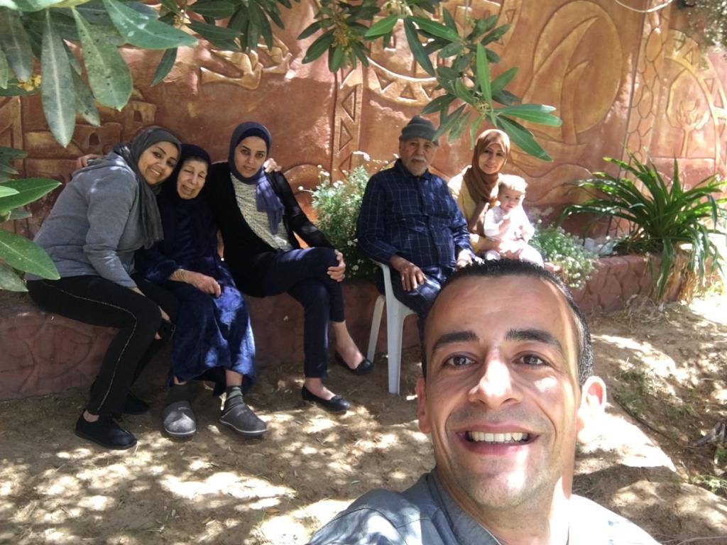 Palestinian Eman Radwan's family poses for a family picture. Her father, mother and brother were killed during Israel's bombardment of Gaza.