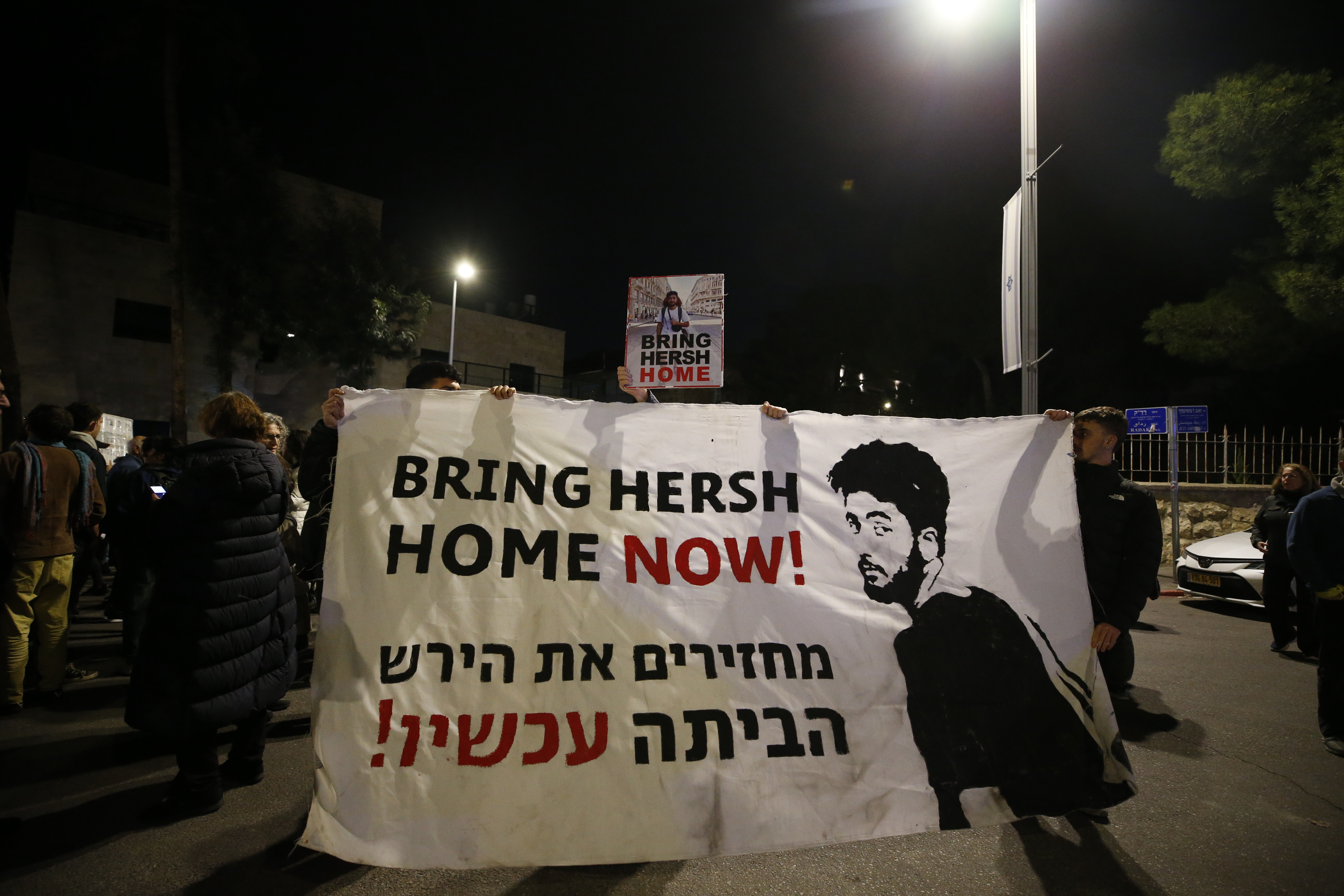 People gather in front of the house of Israeli President Isaac Herzog to demonstrate demanding the release of prisoners held by Hamas in Jerusalem on January 06