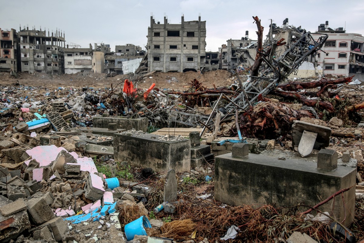 Debris of tombstones are scattered around in the main Al-Shaaf cemetery in the eastern al-Tuffah neighbourhood of Gaza City