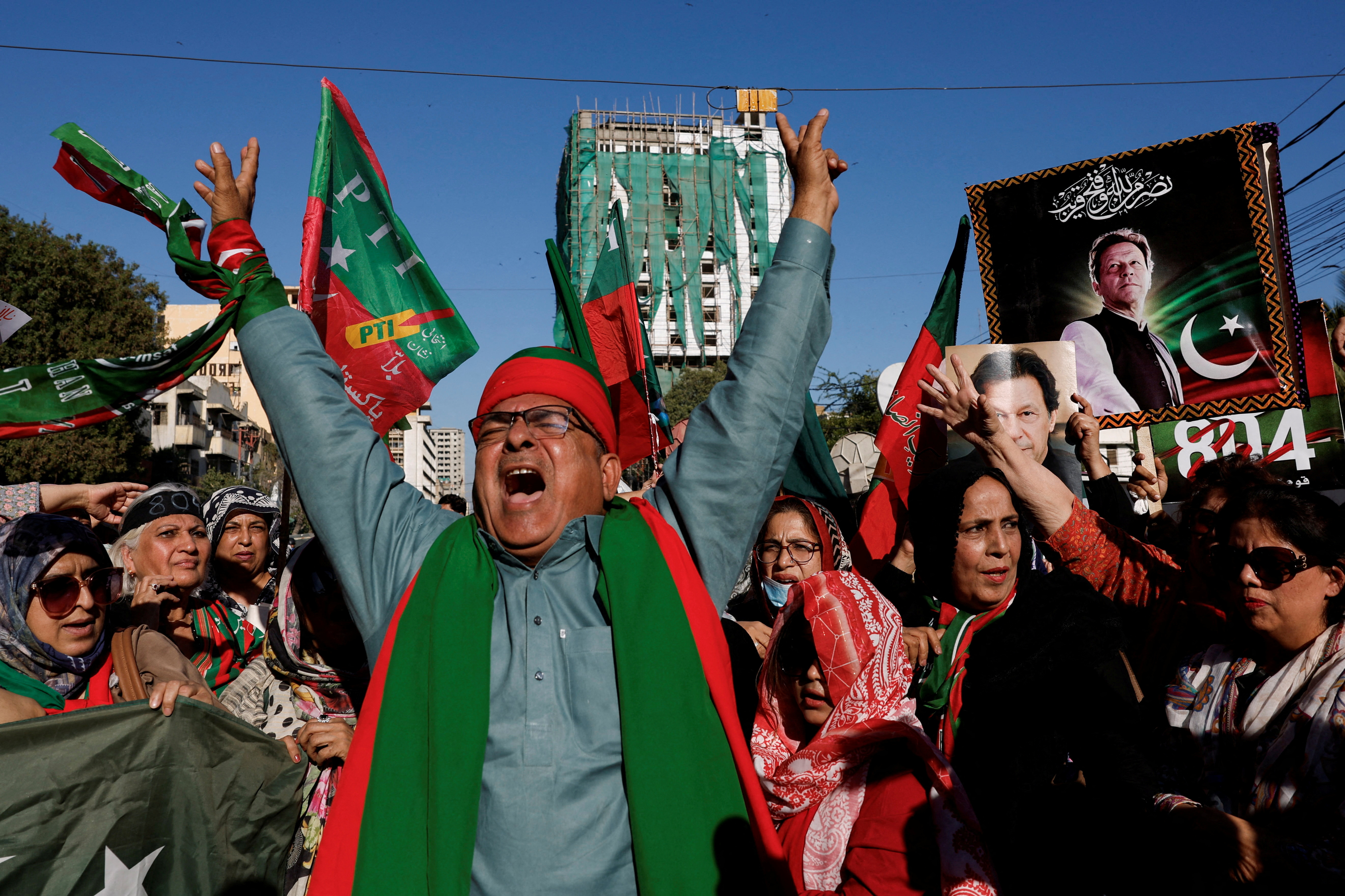 Supporters of former Prime Minister Imran Khan's party, the Pakistan Tehreek-e-Insaf (PTI), chant slogans as they gather during a protest demanding free and fair results of the elections, outside the provincial election commission office in Karachi, Pakistan February 17, 2024. REUTERS/Akhtar Soomro TPX IMAGES OF THE DAY