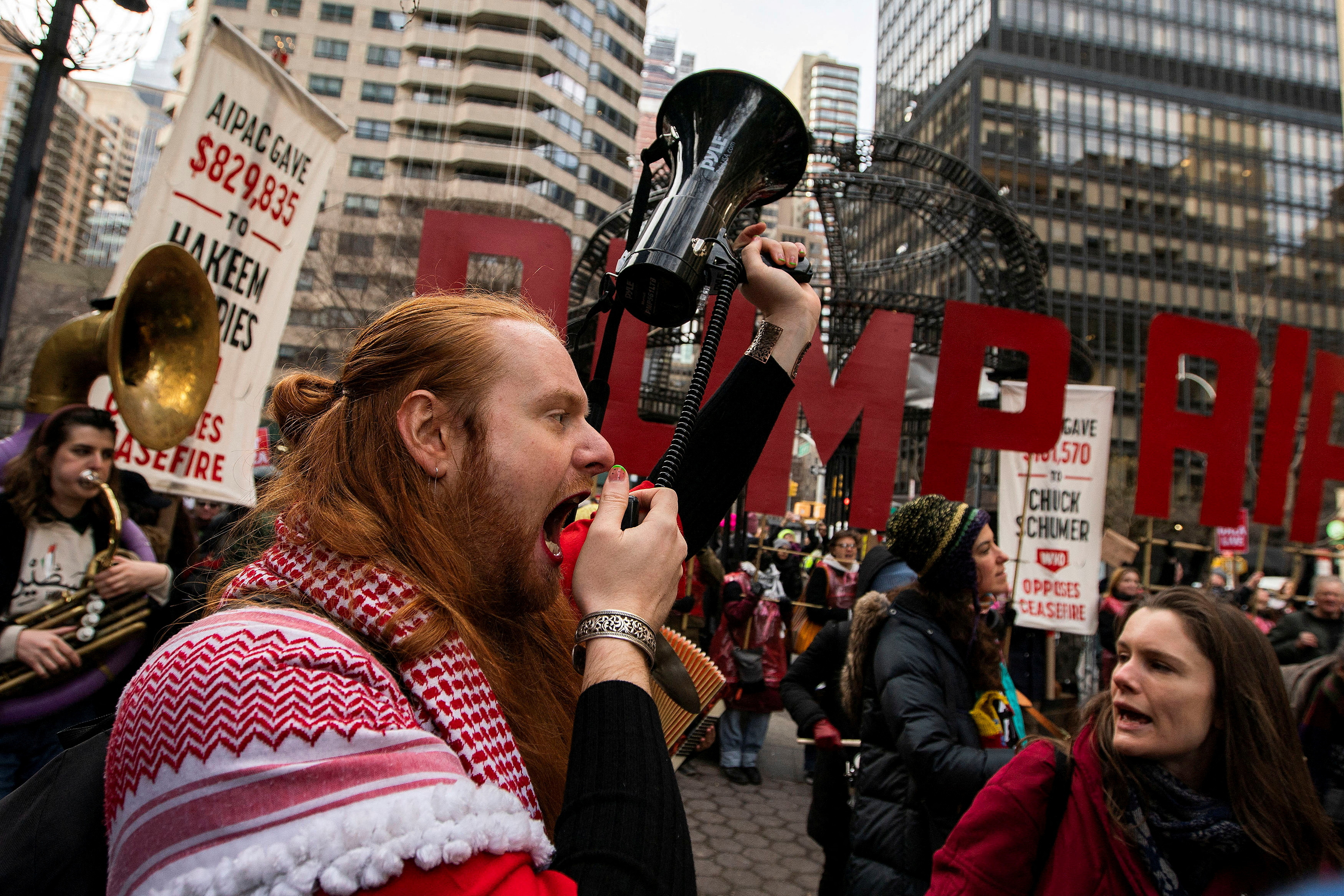 Protesters march demanding a ceasefire and the end of Israel attacks on Gaza