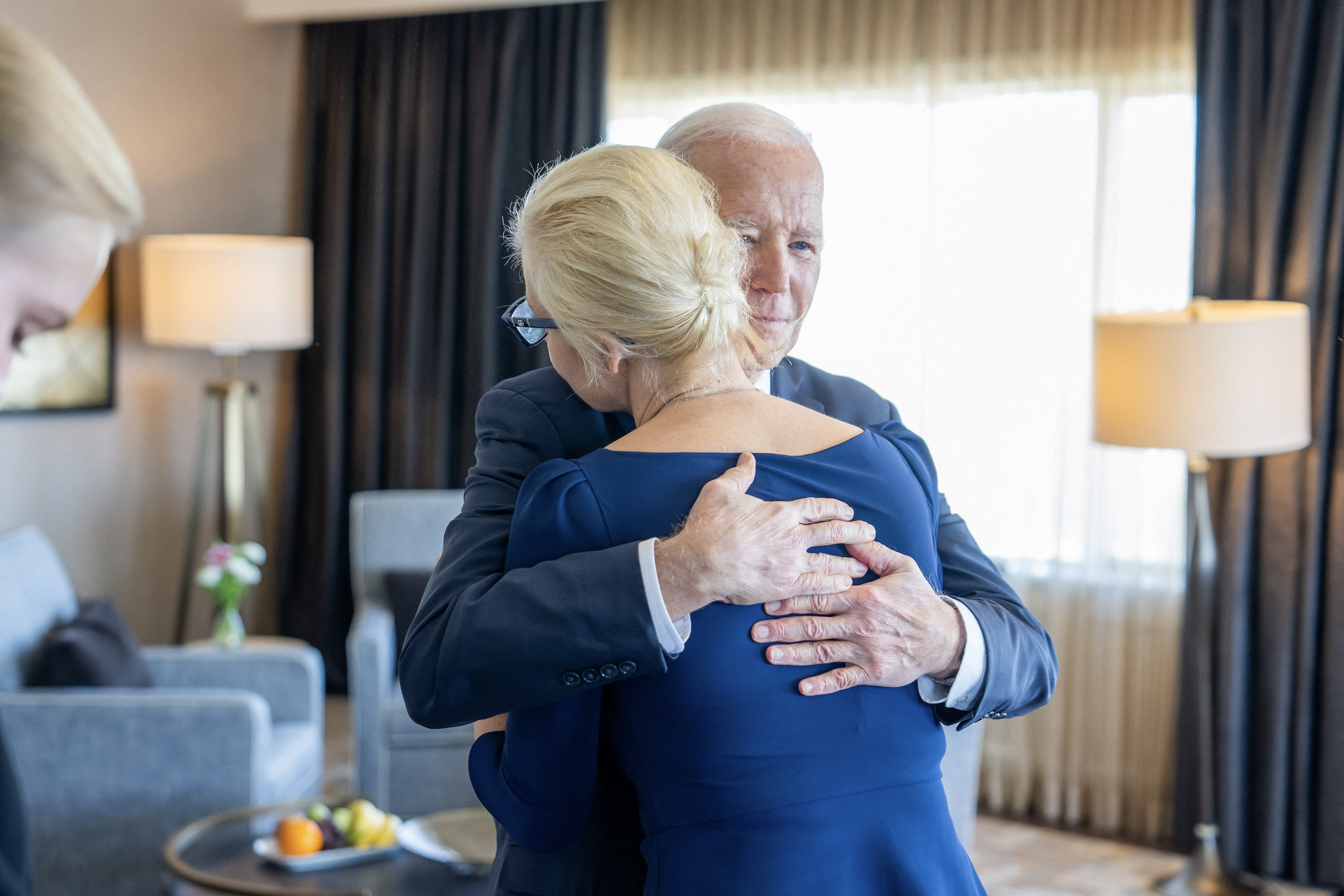 In this photo courtesy of The White House, obtained on February 22, 2024, US President Joe Biden hugs Yulia Navalnaya, widow of Kremlin opposition leader Alexei Navalny, who died last week in a Russian prison, in San Francisco