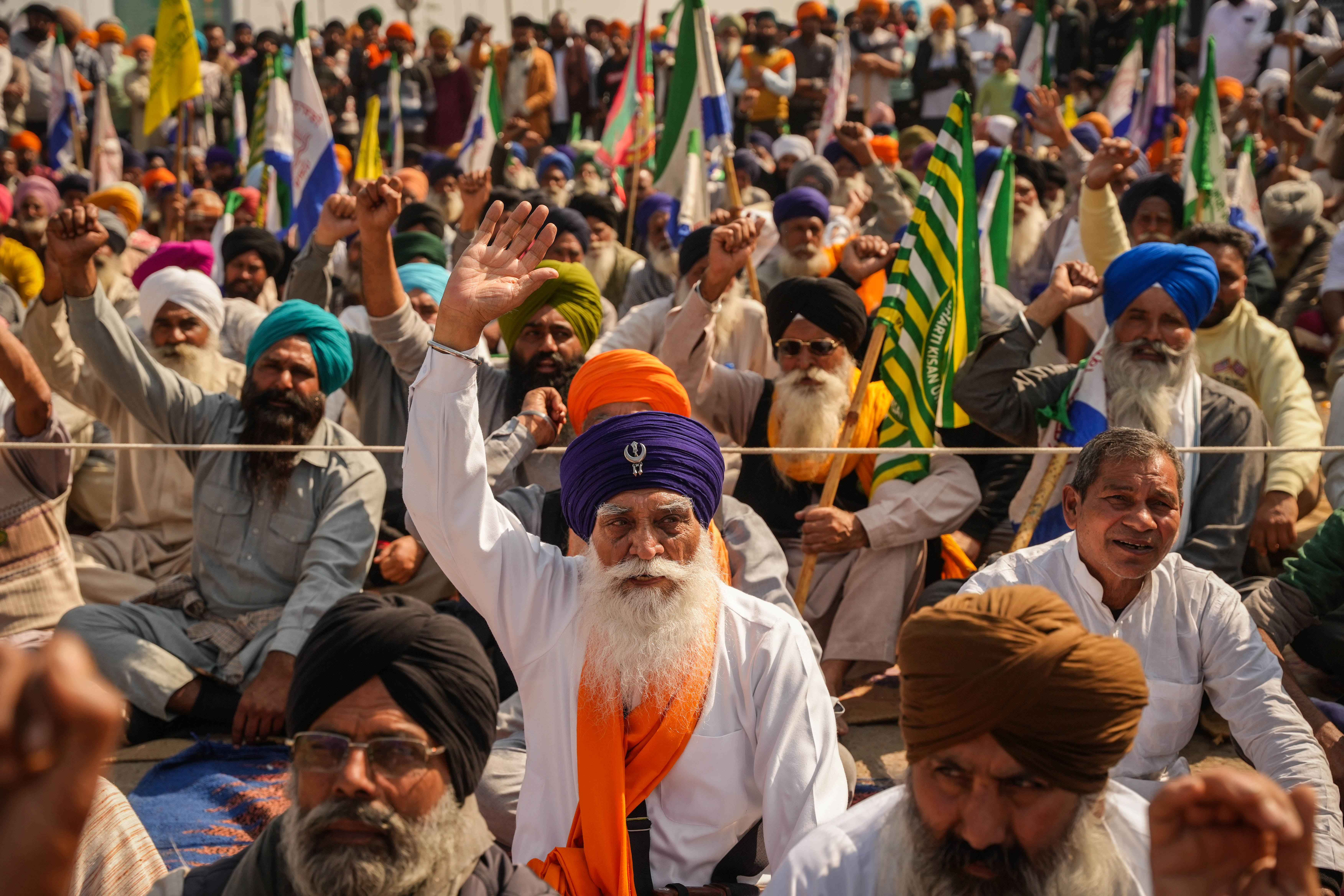 Farmers gathered at the site of the protest in Shambhu border where a leader was addressing them [Md Meherban/Al Jazeera]