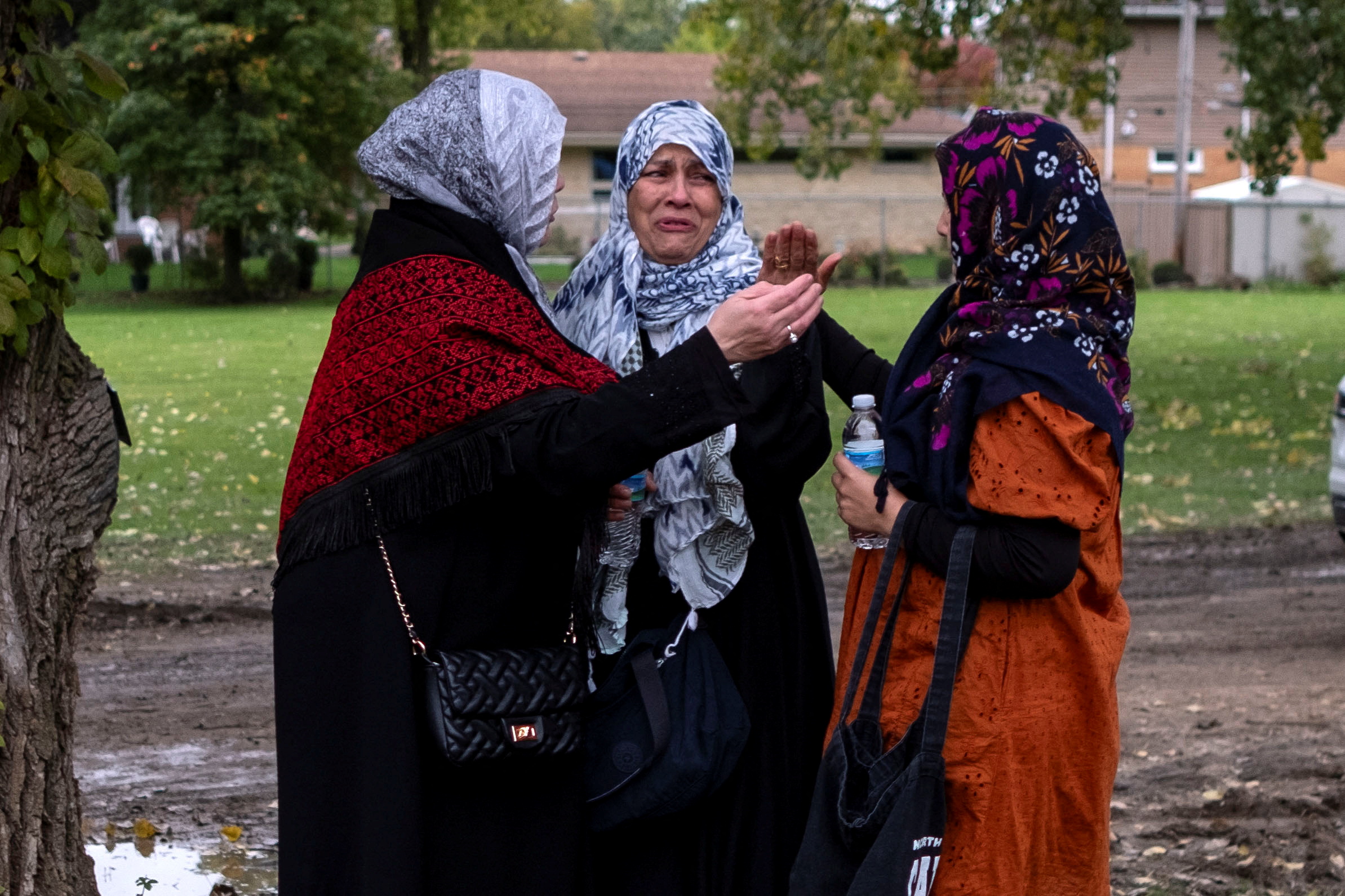 Mourners cry at the funeral for Wadea Al-Fayoume, the 6-year-old Palestinian American boy killed near Chicago