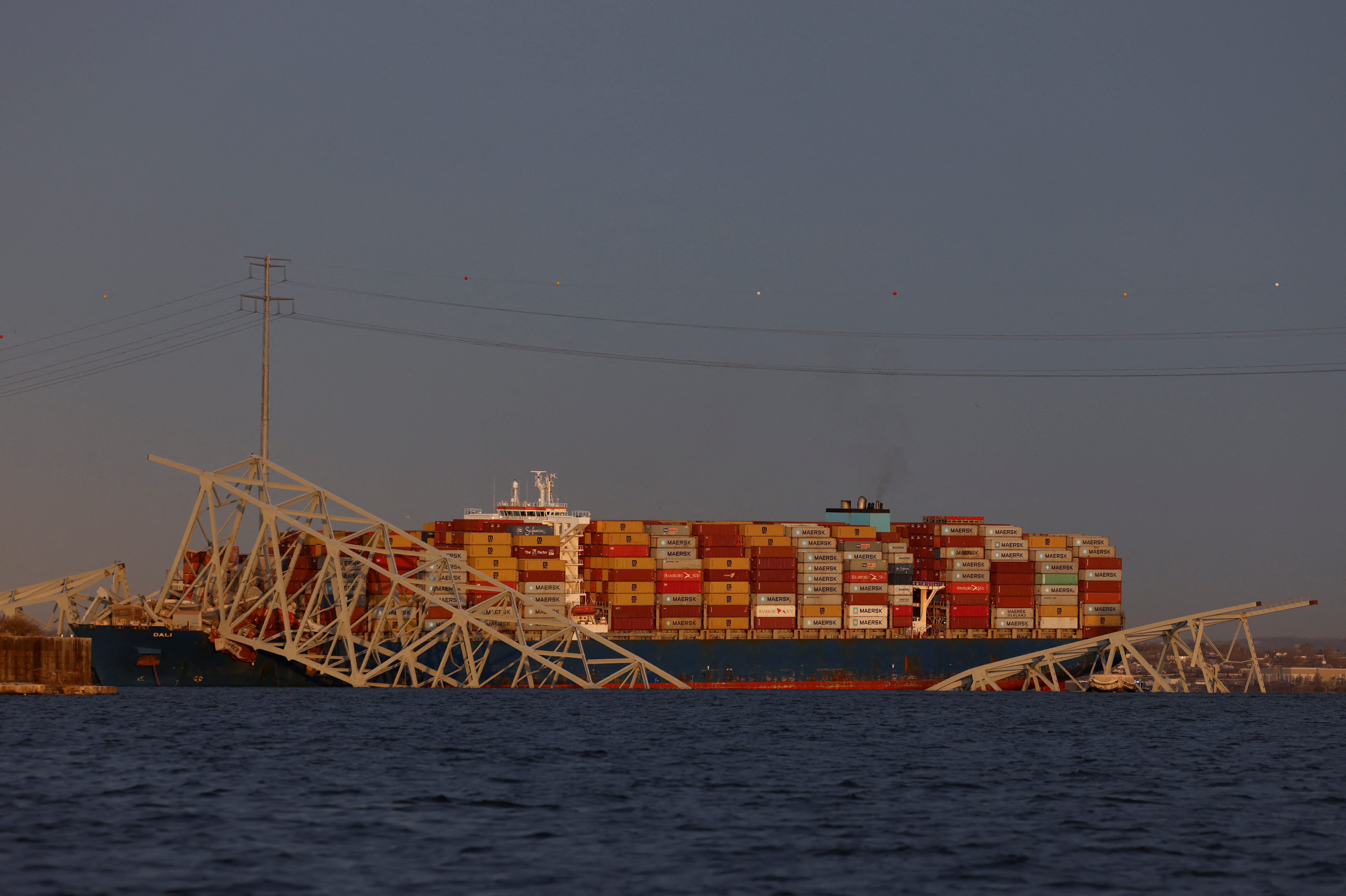 Major US bridge collapses as cargo ship plows into pylon