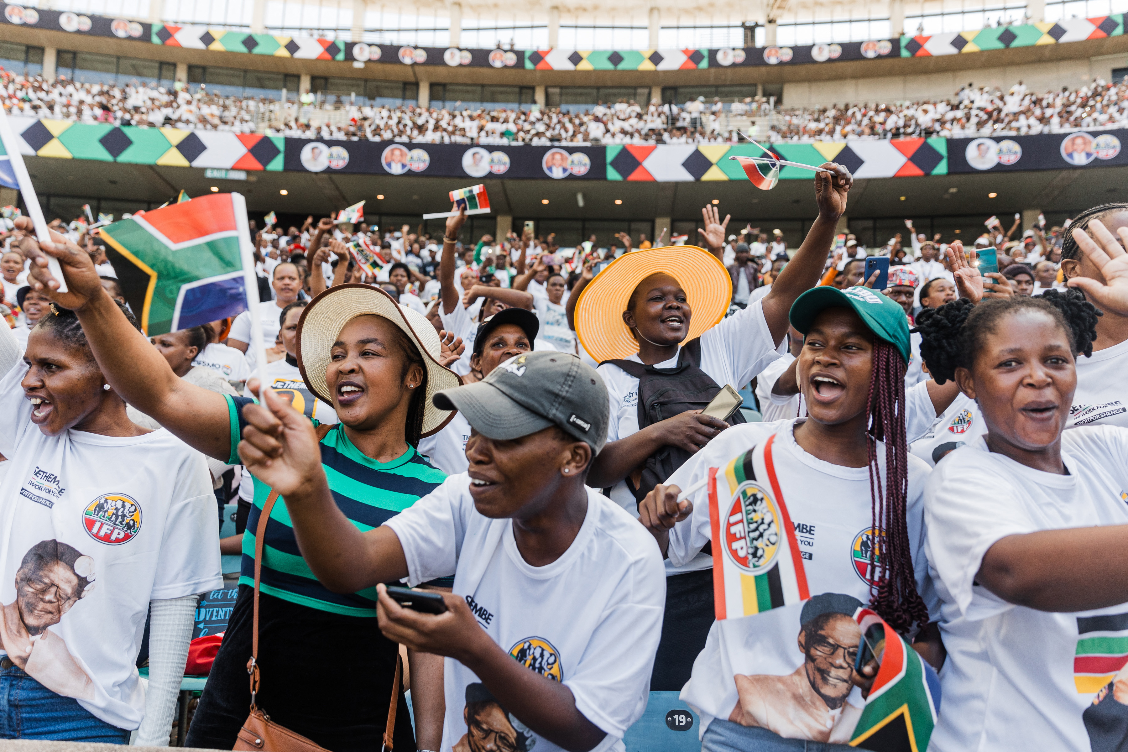 Inkatha Freedom Party (IFP) supporters cheer in the stands during the IFP election manifesto launch at the Moses Mabhida Stadium in Durban on March 10