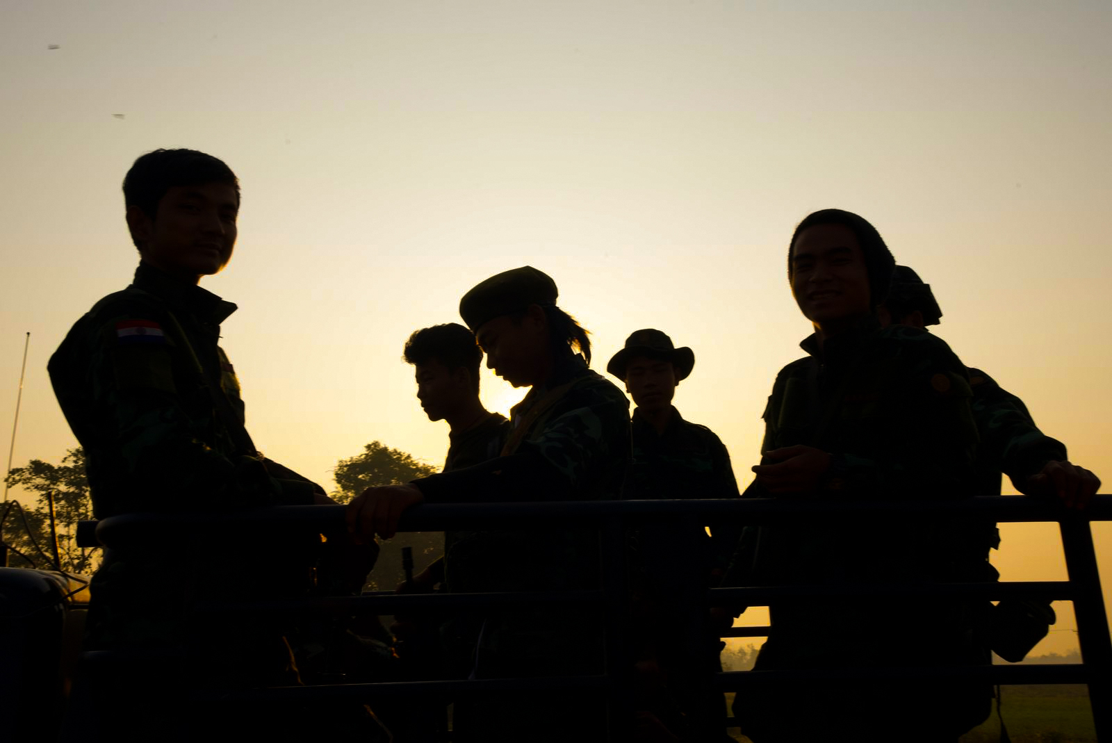 Kayah fighters silhouetted against the sky