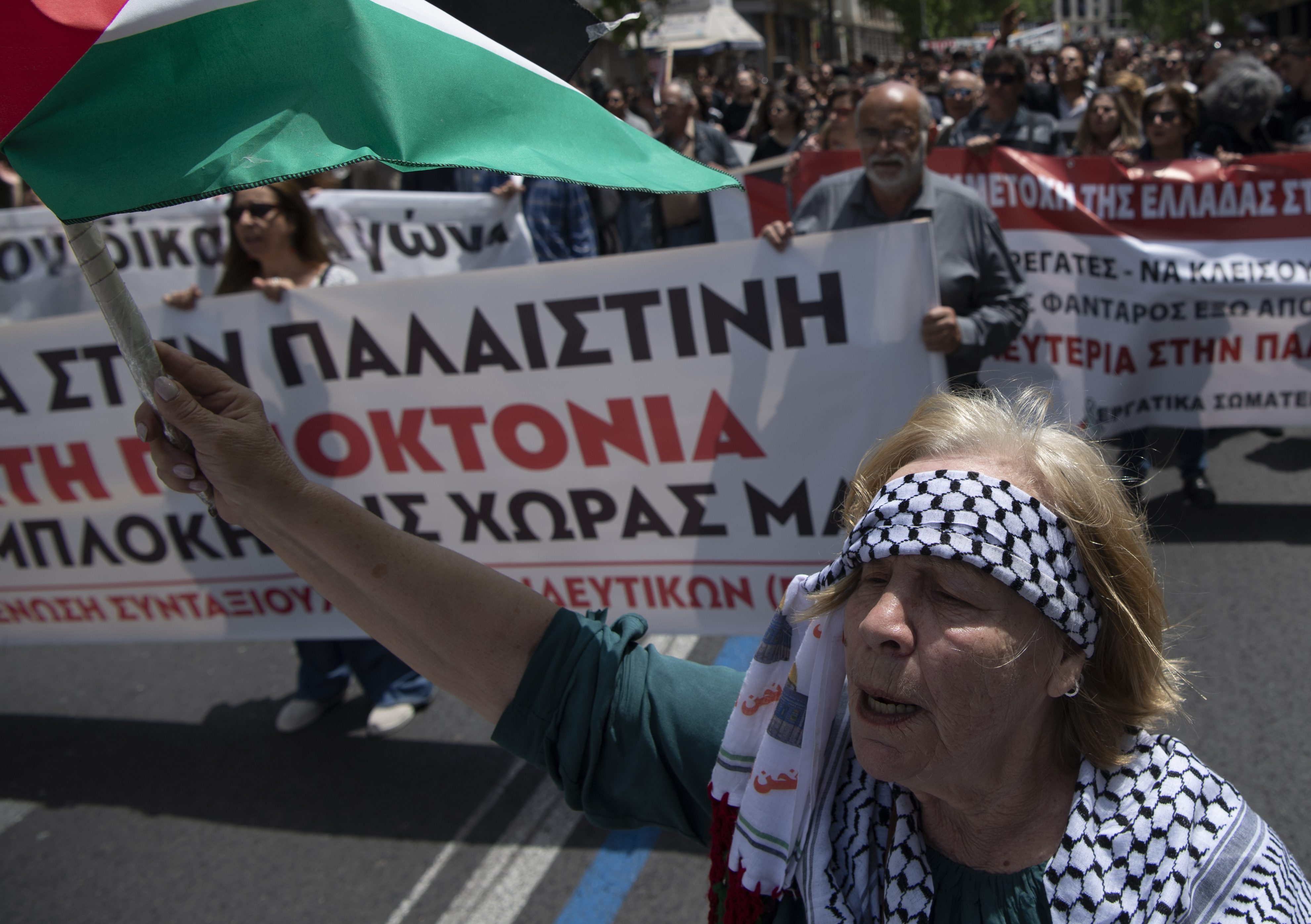 A woman shouts slogans during a protest against Israel's military action in Gaza at Syntagma Square, central Athens, Greece, on May 11, 2024