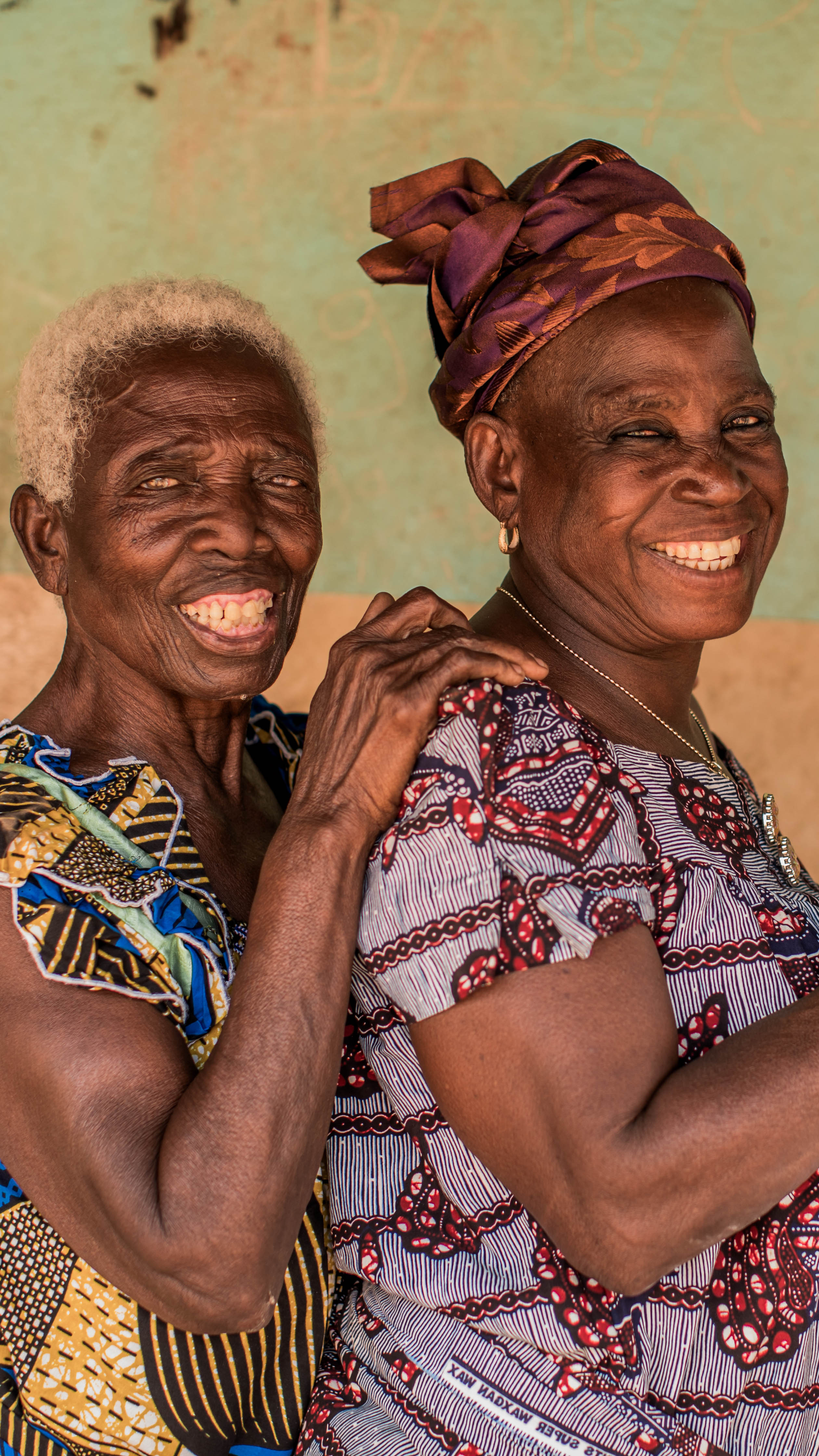 Gnoussiado, 60 (Right), and mother, Akoyiki, 80 in their village in Togo. [Izla Bethdavid/Plan International]