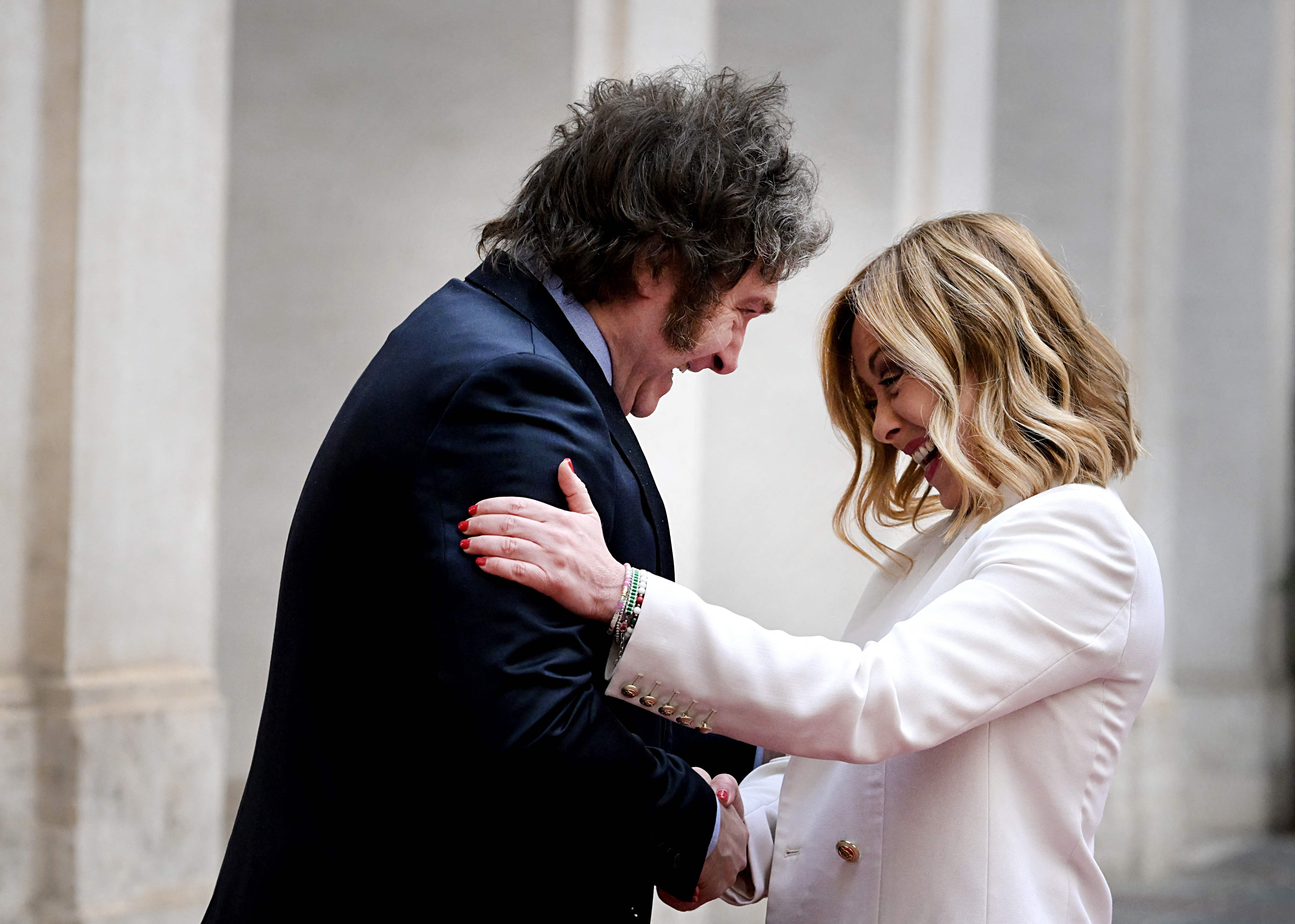 Italy's Prime Minister, Giorgia Meloni welcomes Argentina's President Javier Milei at Palazzo Chigi prior to their meeting, on February 12, 2024 in Rome, Italy [Tiziana Fabi/AFP]