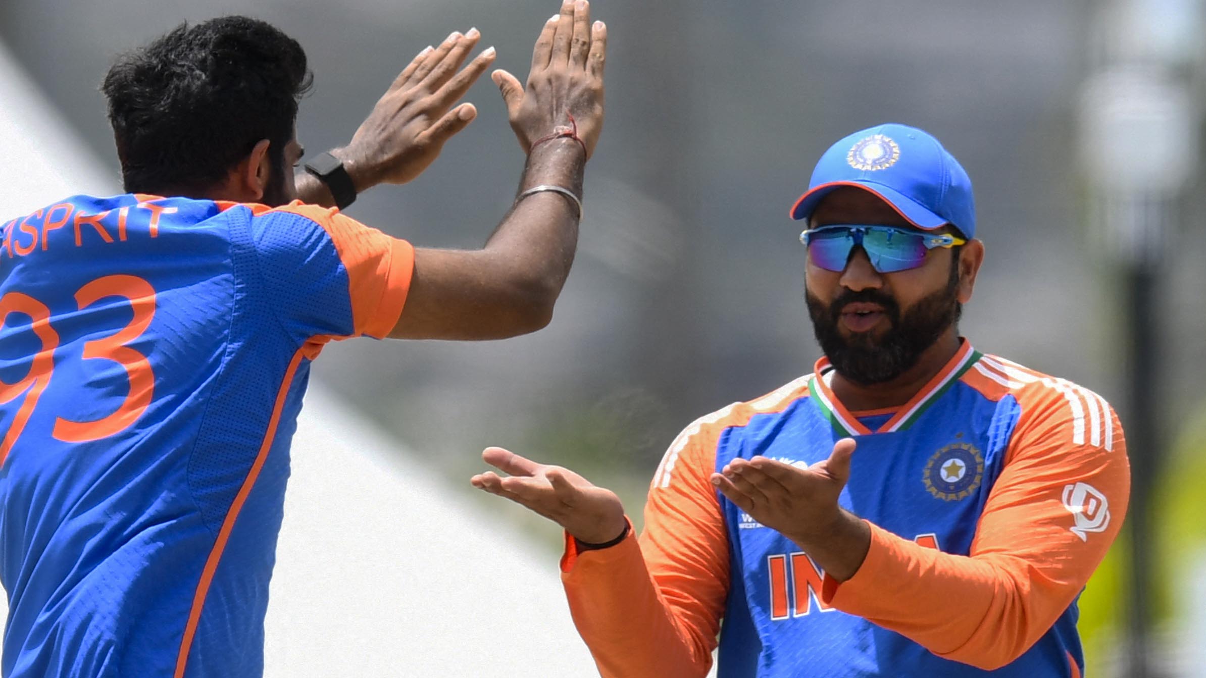 Captain Rohit Sharma, right, has been the star of the show with the bat for India at the T20 World Cup