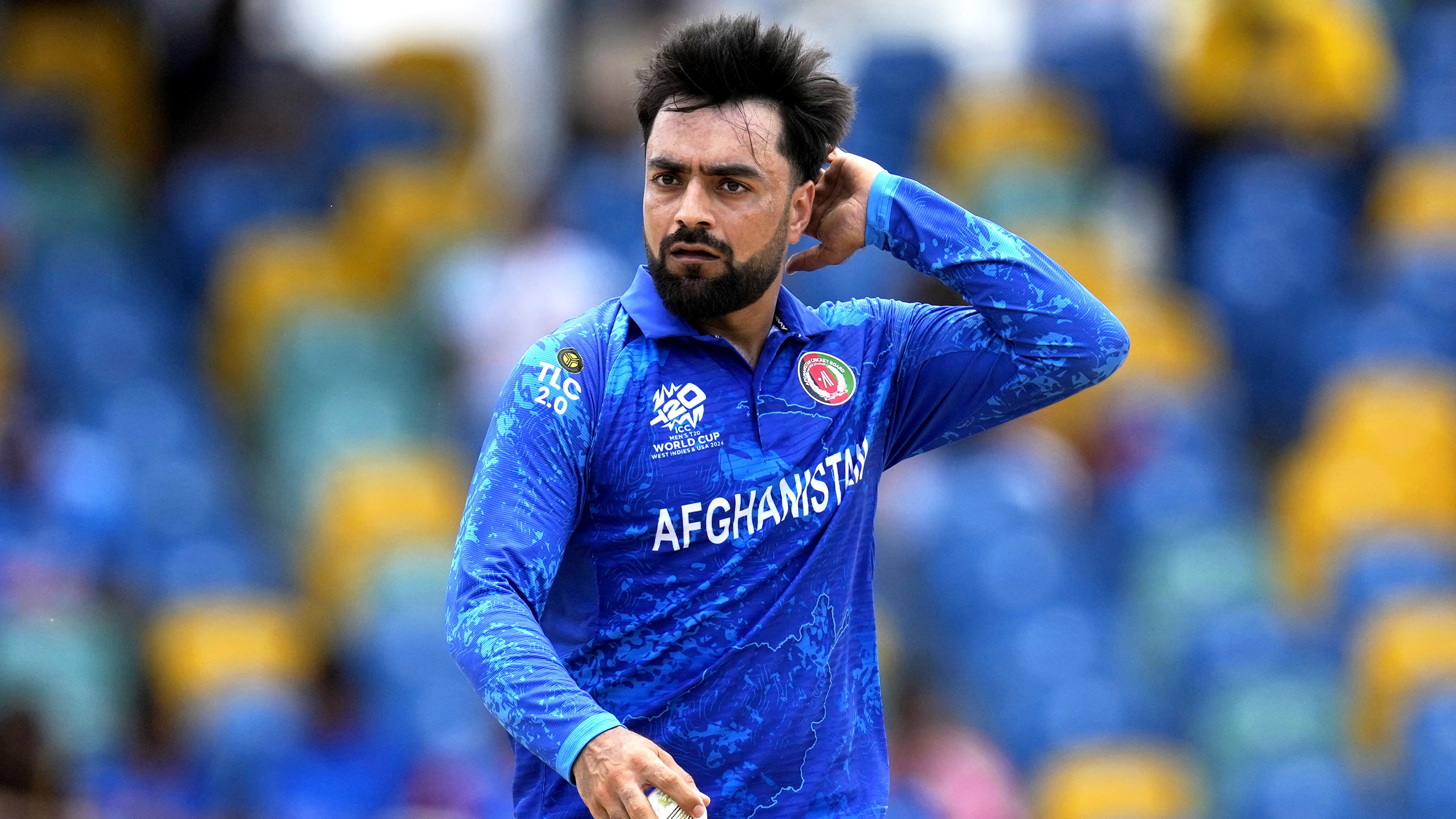 Afghanistan's captain Rashid Khan reacts after bowling a delivery during the ICC Men's T20 World Cup cricket match between Afghanistan and India at Kensington Oval in Bridgetown, Barbados, Thursday, June 20, 2024. (AP Photo/Ricardo Mazalan)