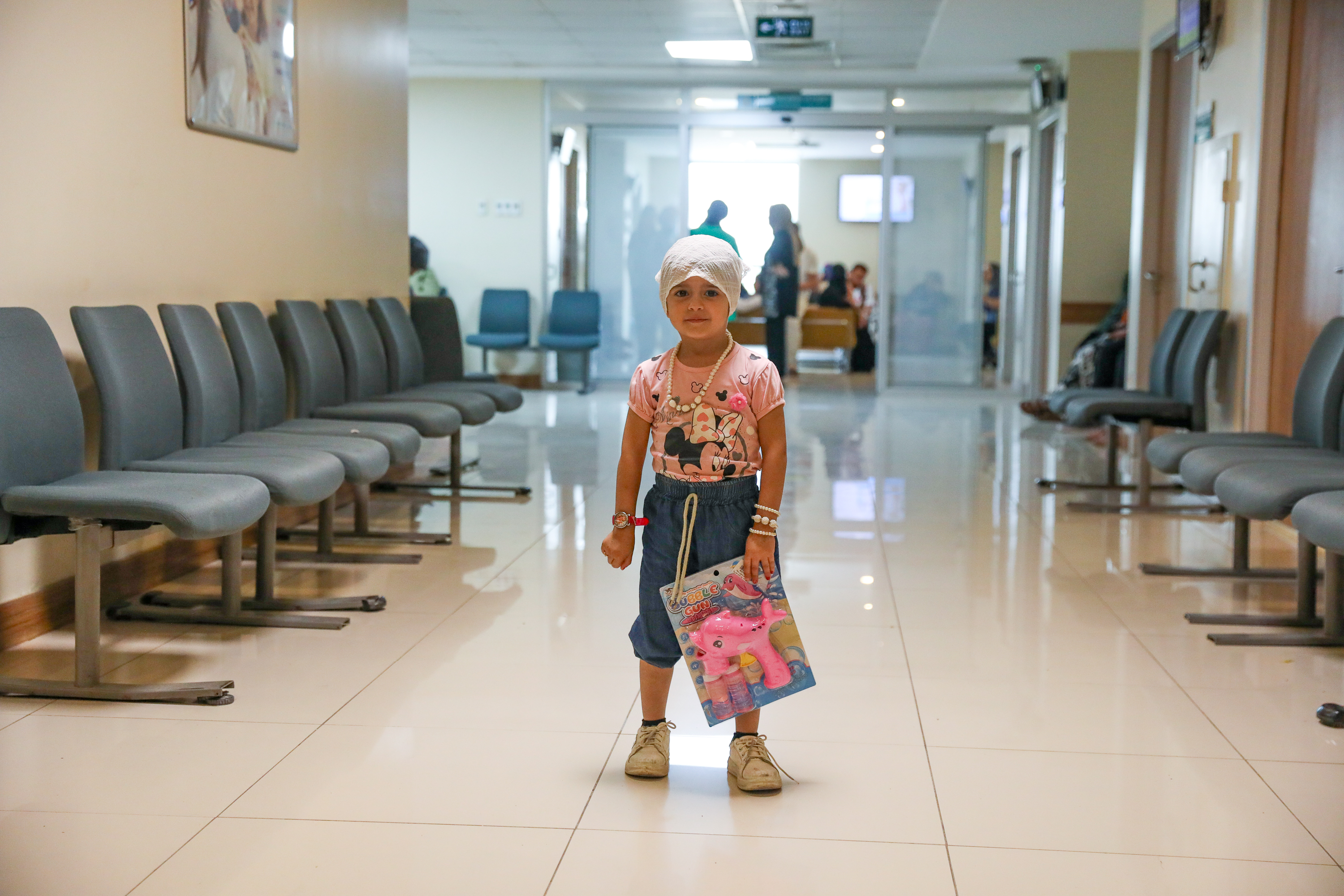 Girl standing in corridor