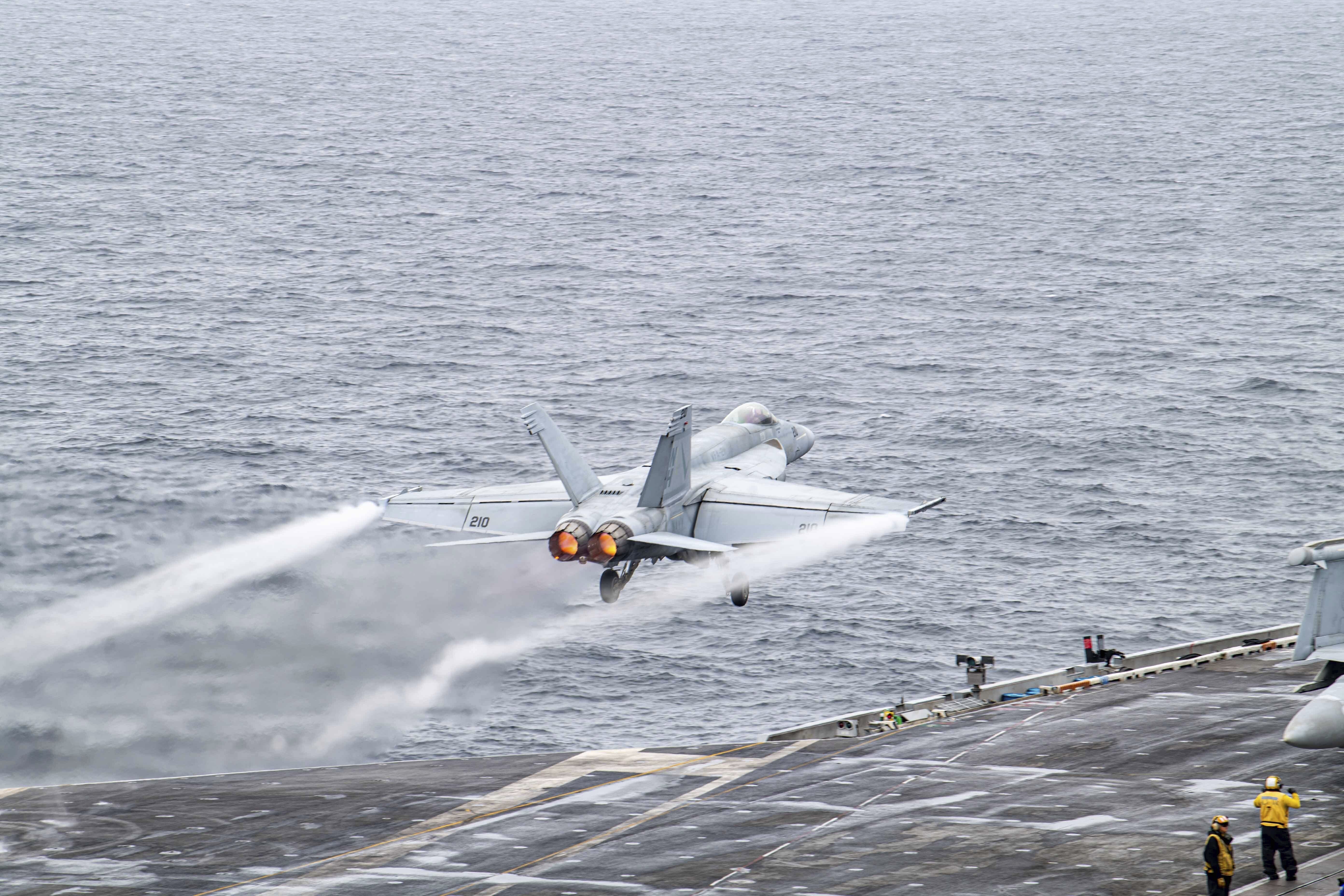 A US fighter jet taking off from the USS Theodore Roosevelt aircraft carrier during the Freedom Edge exercises.