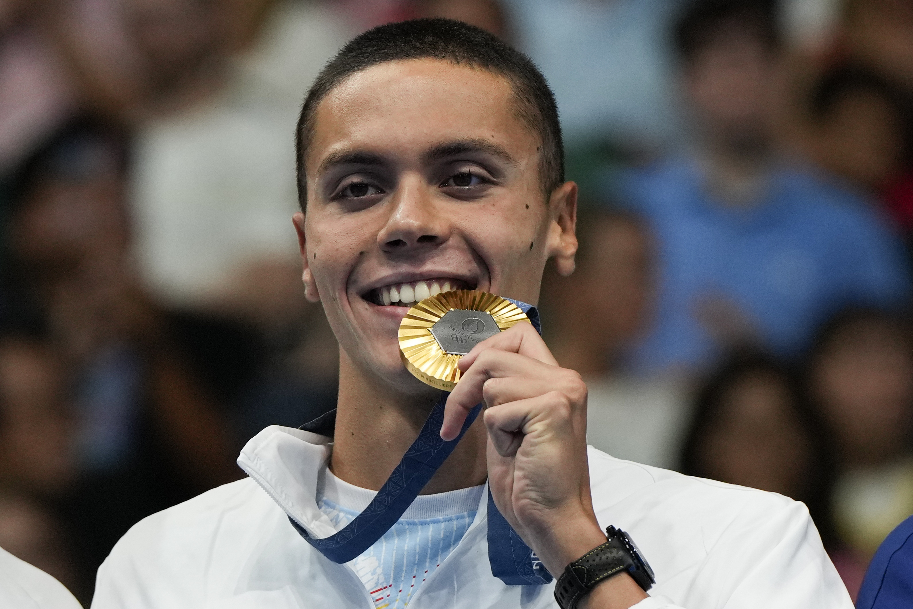 Romania's David Popovici beat Britain's Matt Richards by a knife-edge 0.02 of a second to win the men's 200 metres freestyle gold at the Paris Olympics