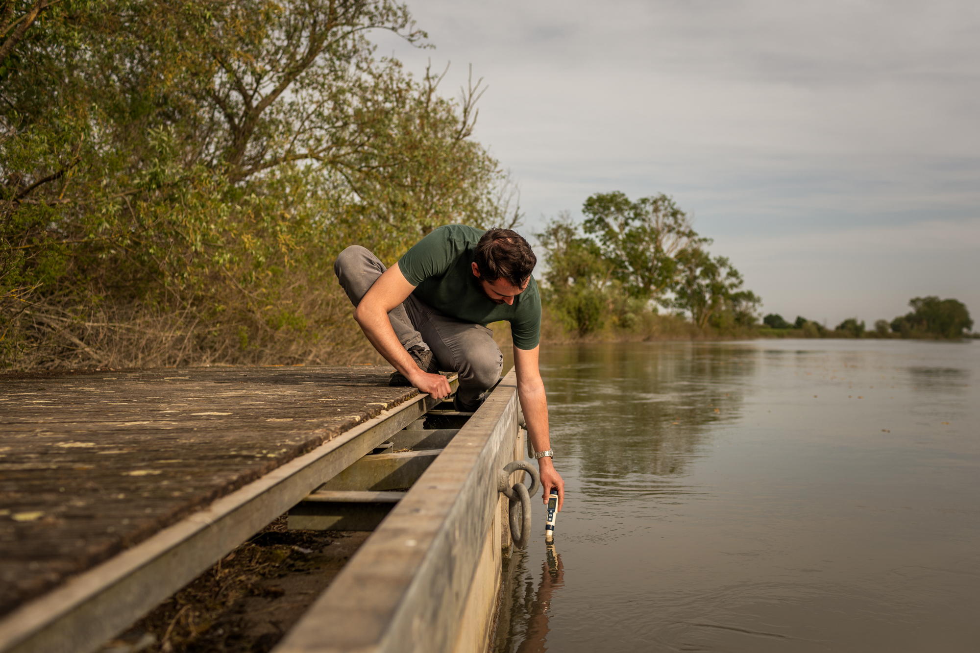 Marco Uccellatori, a 29-year-old farmer, measures the level of electrical conductivity of the waters of the Po della Donzella that irrigates his farm in Taglio di Po, Rovigo, Veneto. Through conductivity analysis, it is possible to evaluate the quantity of salt present in the water and determine their use for agriculture