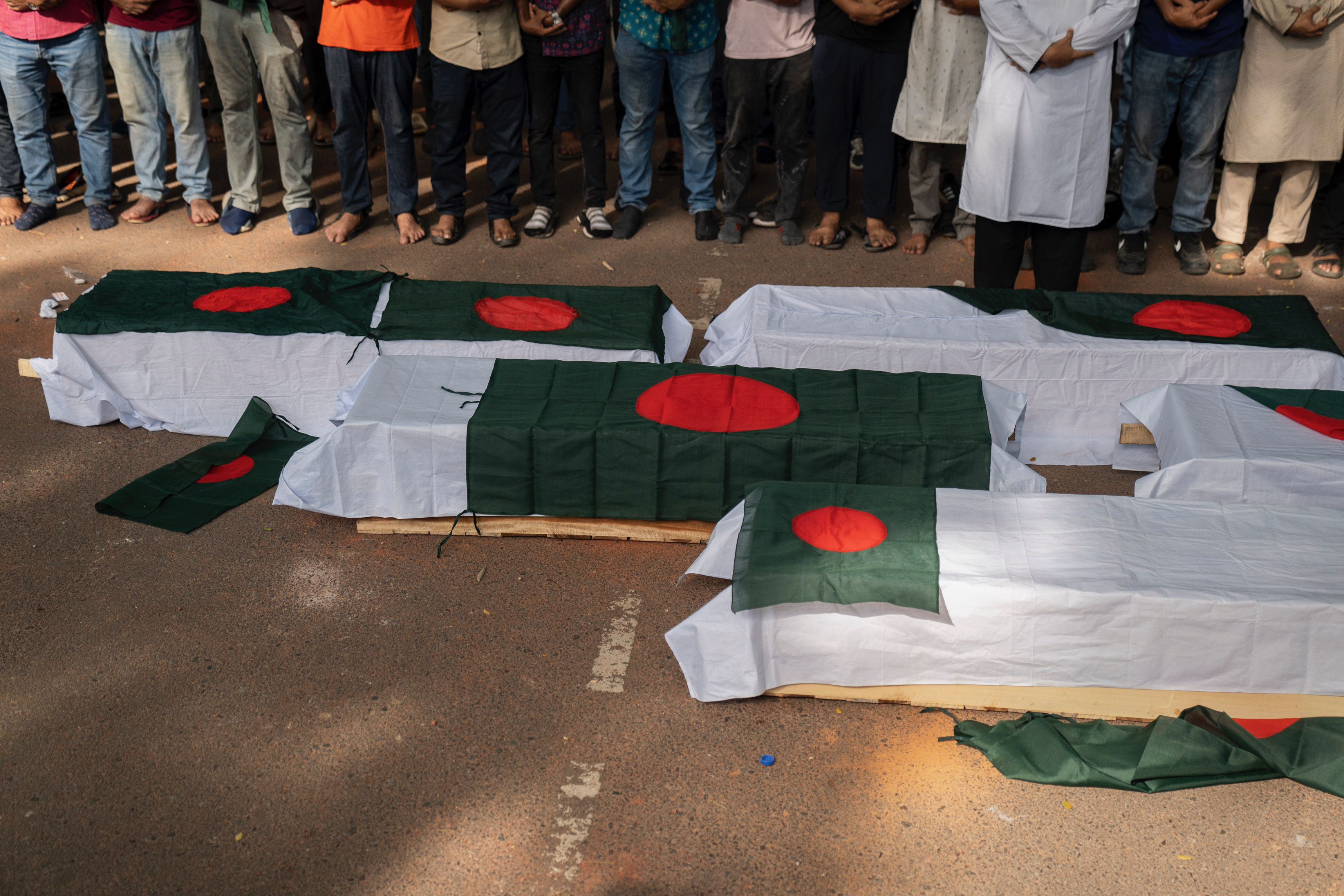 Quota Reform Movement students enact a funeral procession for their martyred comrades in the streets around Dhaka University, Dhaka, Bangladesh on July 17, 2024 [Courtesy of Drik]