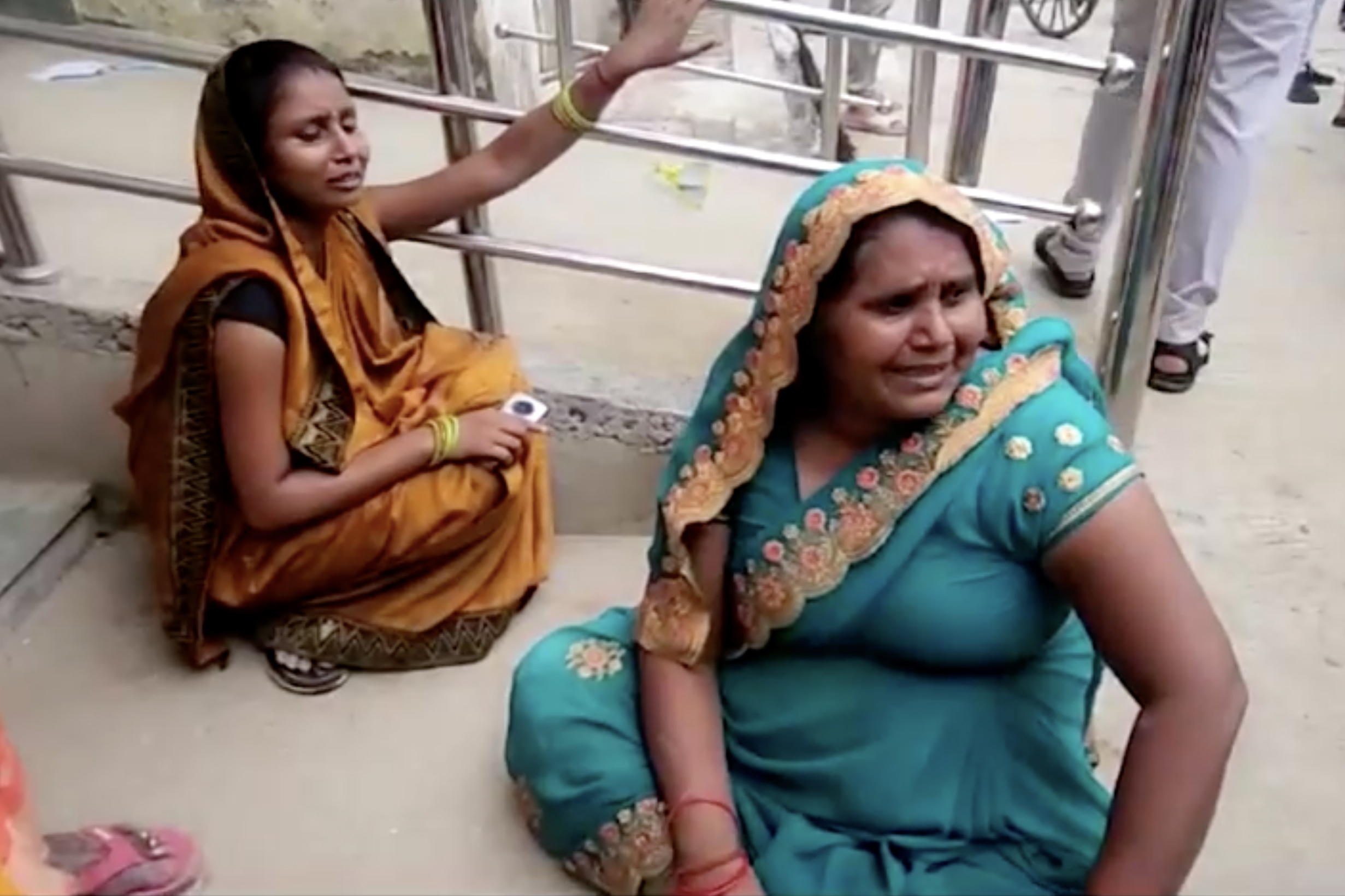 People crying outside the hospital