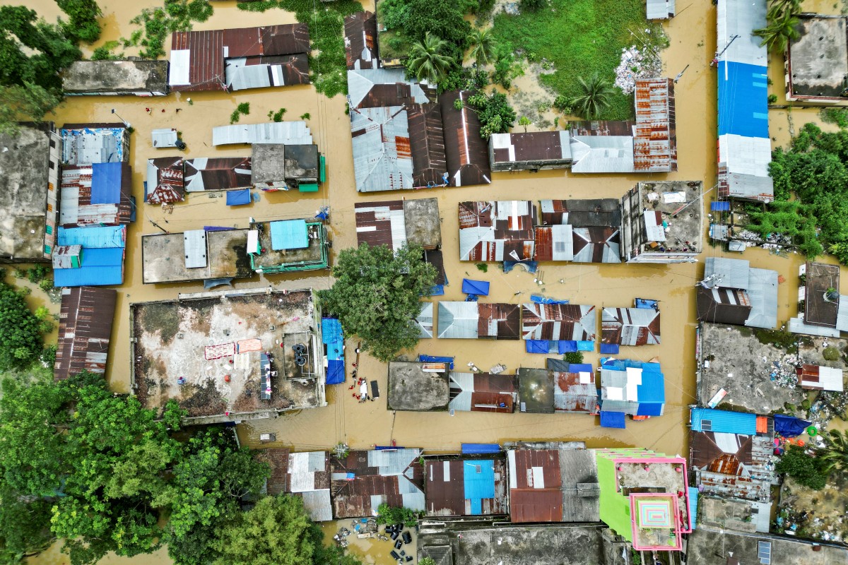 An aerial view shows partially submerged houses after flood in Feni