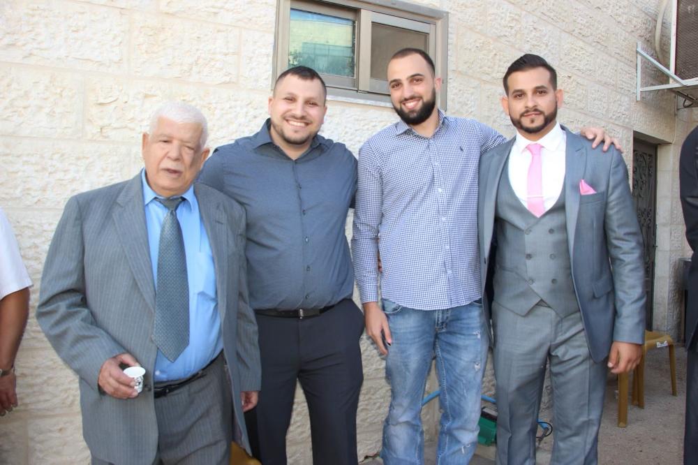 Palestinian American man Omar Assad (left) poses with relatives