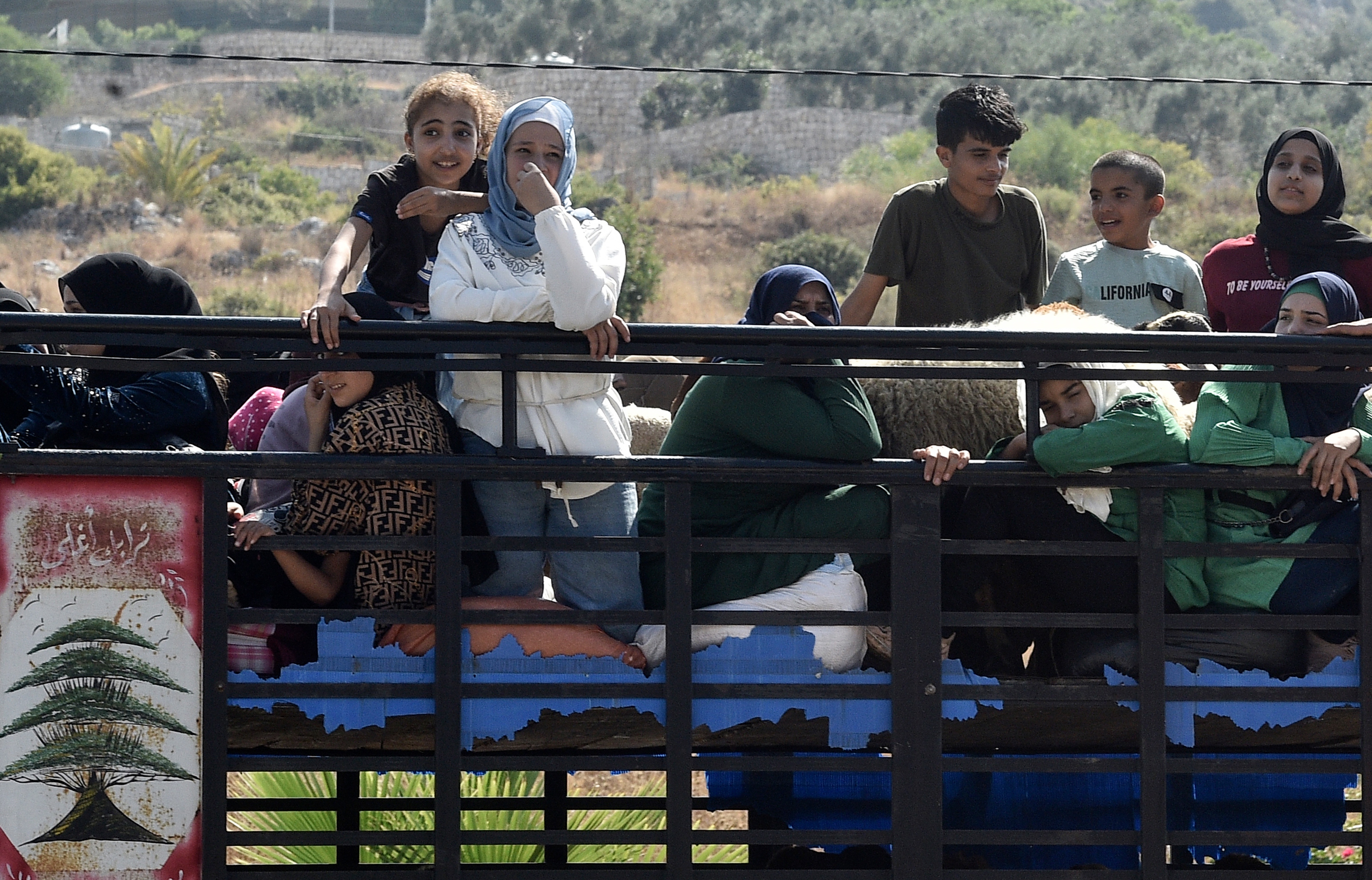 epa11622225 Lebanese people, who are fleeing southern Lebanon, travel with their belongings towards Beirut along the Damour highway, Lebanon, 24 September 2024. Thousands of people fled southern Lebanon after an evacuation warning by the Israeli army, which on 23 September announced that it had launched 'extensive' airstrikes on Hezbollah targets in the country. According to Lebanon's Ministry of Health, at least 558 people have been killed and more than 1,835 have been injured following continued airstrikes on southern Lebanese towns and villages. EPA-EFE/WAEL HAMZEH