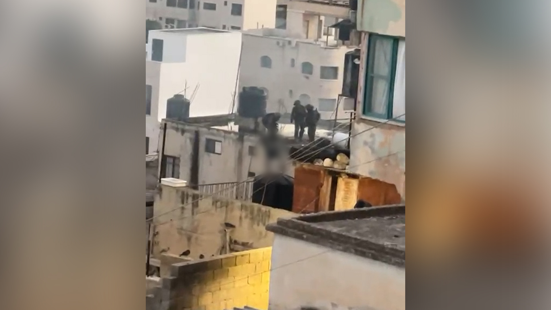 Video captures Israeli soldiers pushing dead bodies from roof