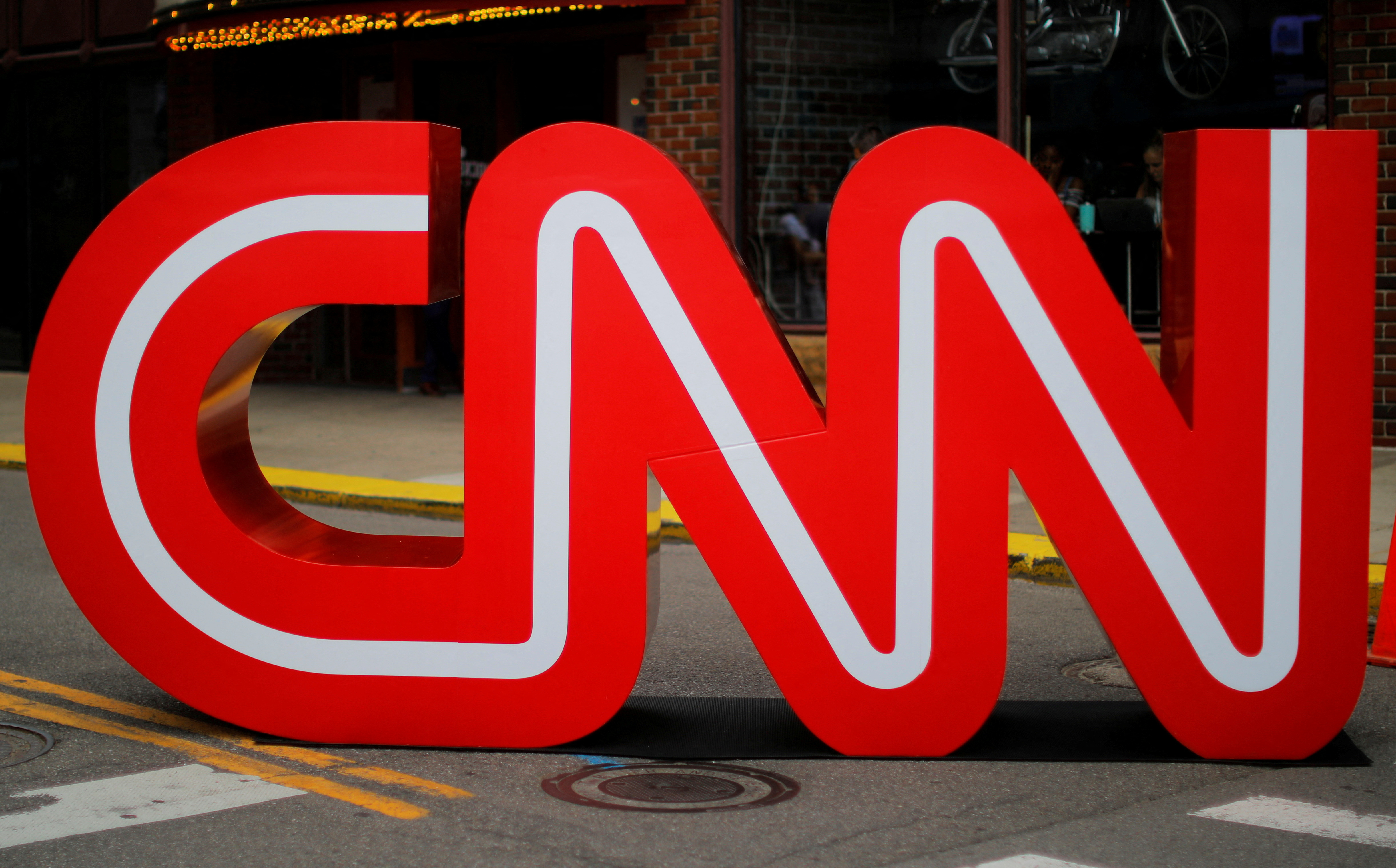 FILE PHOTO: The CNN logo stands outside the venue of the second Democratic 2020 U.S. presidential candidates debate, in the Fox Theater in Detroit, Michigan, U.S., July 30, 2019. REUTERS/Brian Snyder/File Photo