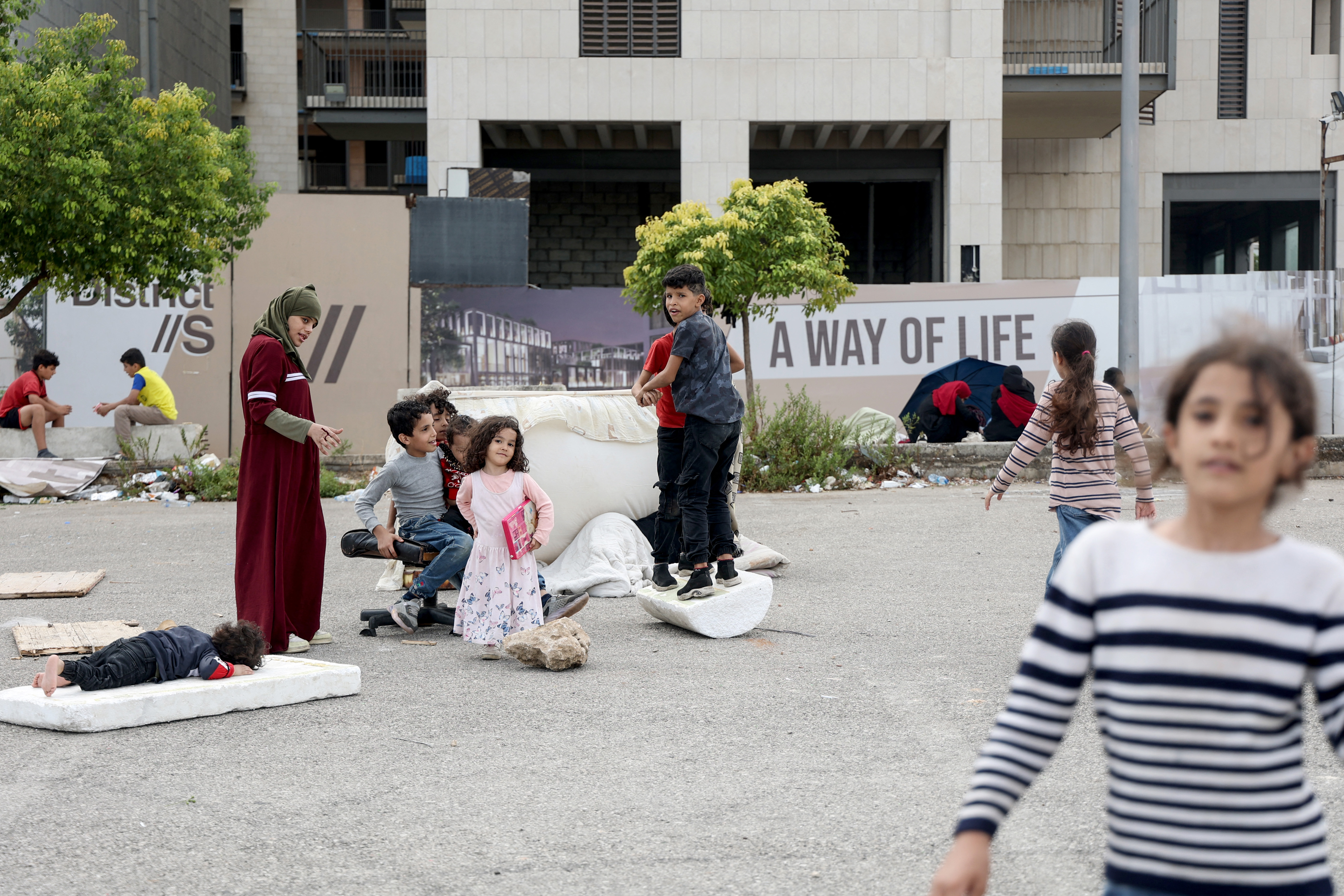 Displaced children play in downtown Beirut on October 1