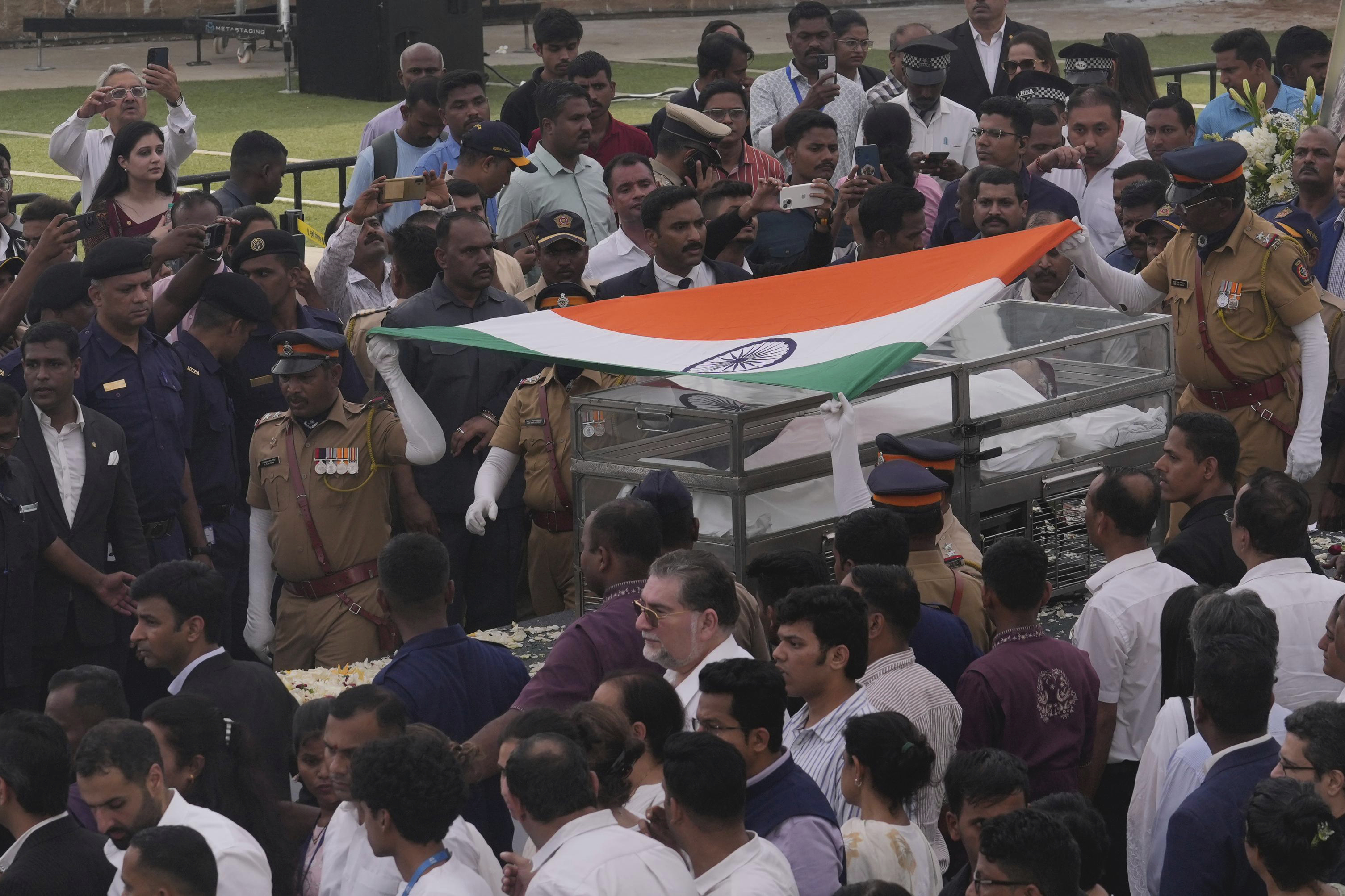 Body of Indian business leader Ratan Tata who died on Wednesday night is taken for cremation with full state honors, in Mumbai, India
