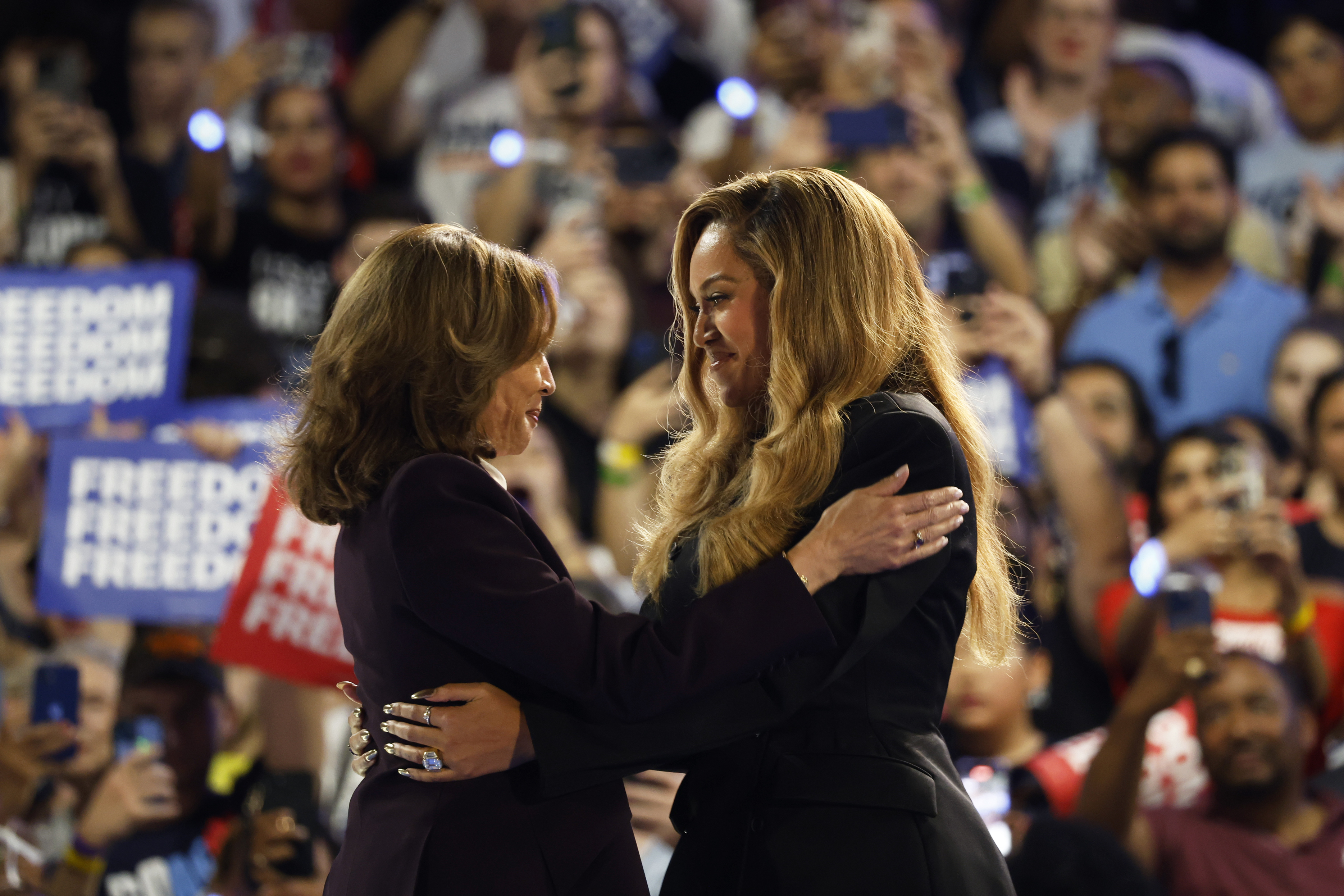 Kamala Harris and singer Beyonce embrace on stage a rally in Houston, Texas.