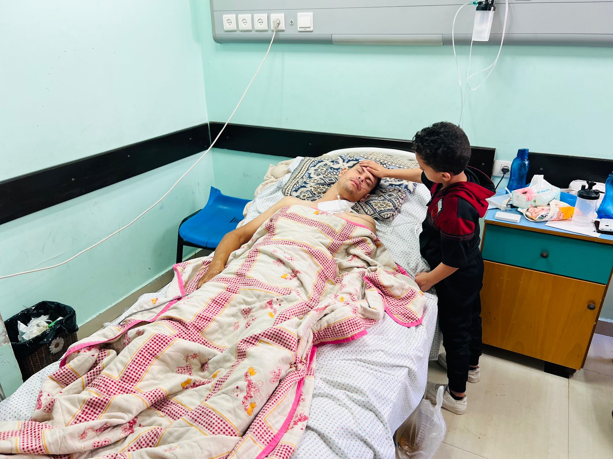 Al Jazeera cameraman Fadi al-Wahidi, who was hit by an Israeli sniper in the Gaza Strip on October 9, is in a coma Ahmad Hamadan/Al Jazeera