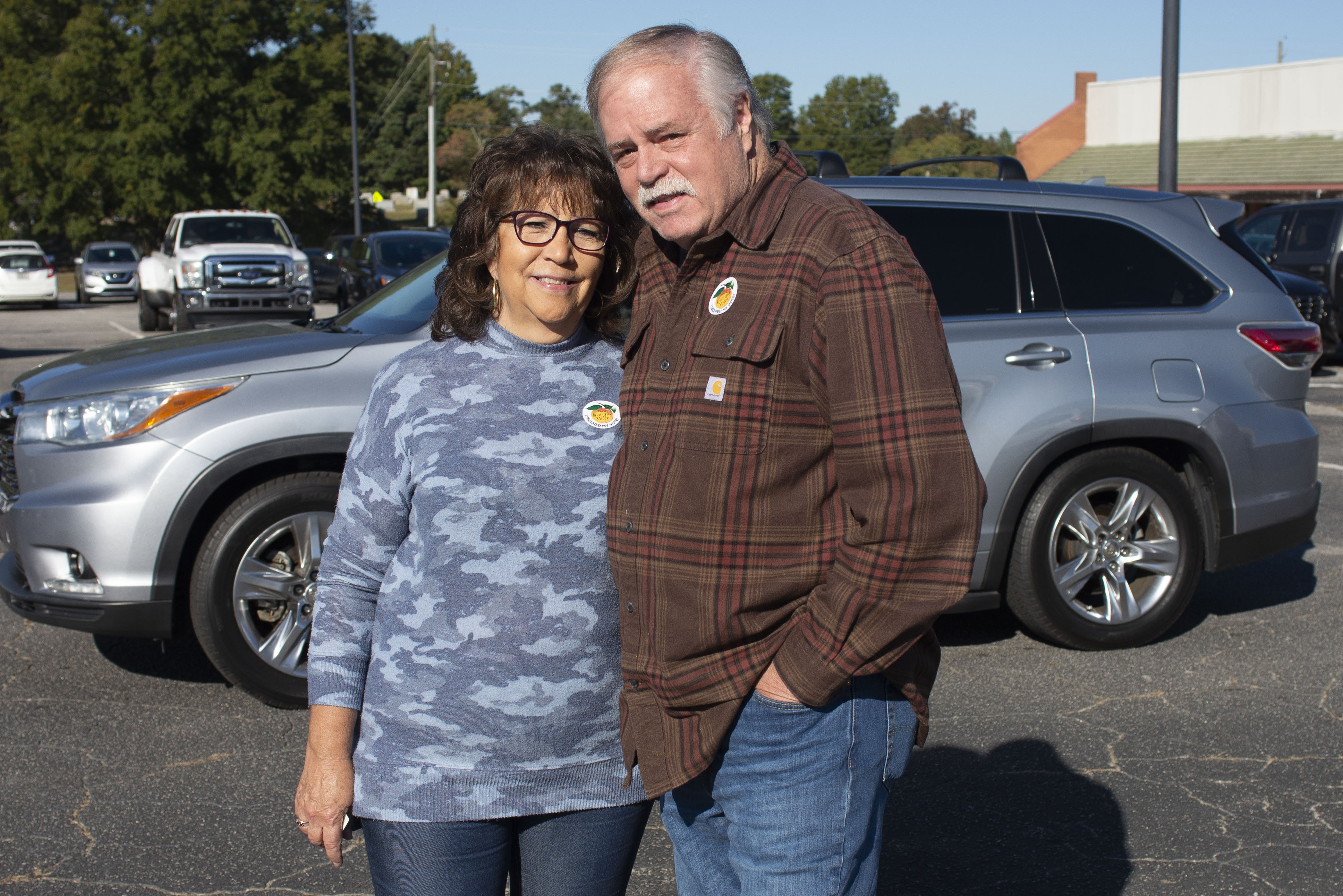 Teresa and Scott Carter cast their ballots in Spalding County, Georgia