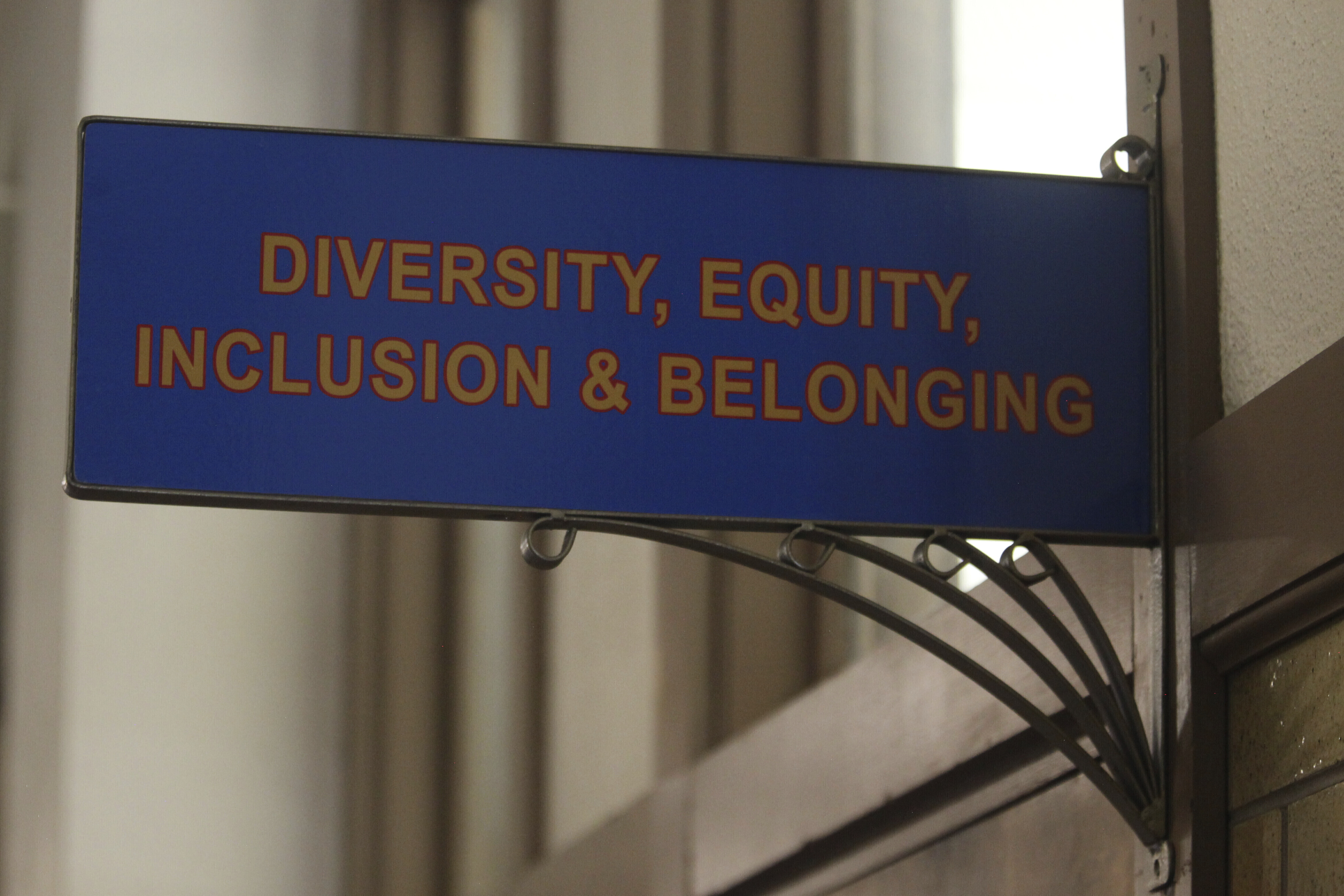 The sign above the door to the Office of Diversity, Equity, Inclusion and Belonging inside the main administration building on the main University of Kansas campus.