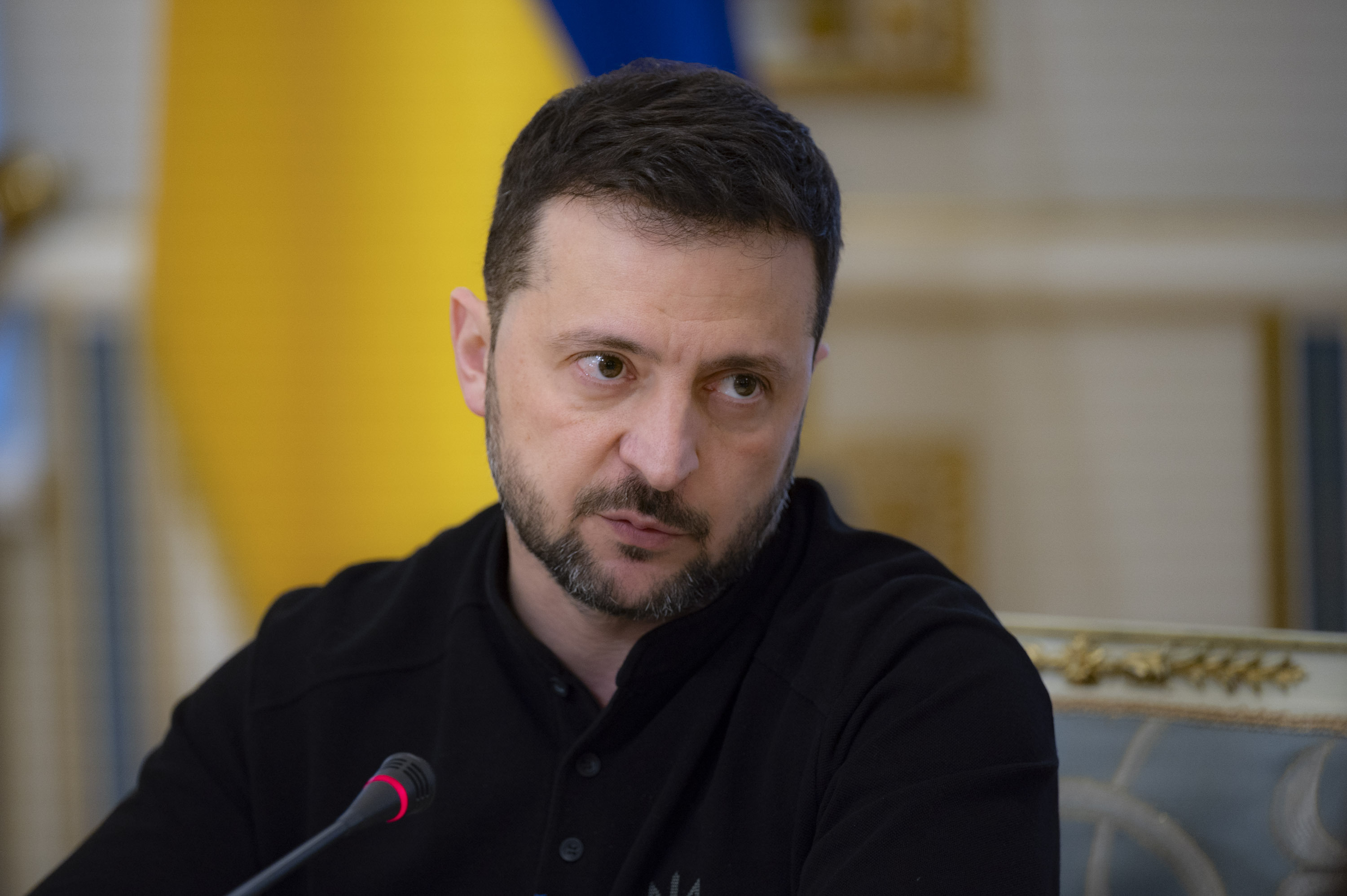 In this photo provided by the Ukrainian Presidential Press Office, Ukrainian President Volodymyr Zelenskyy talks with Ukrainian journalists in Kyiv, Ukraine, Monday, Oct. 21, 2024.