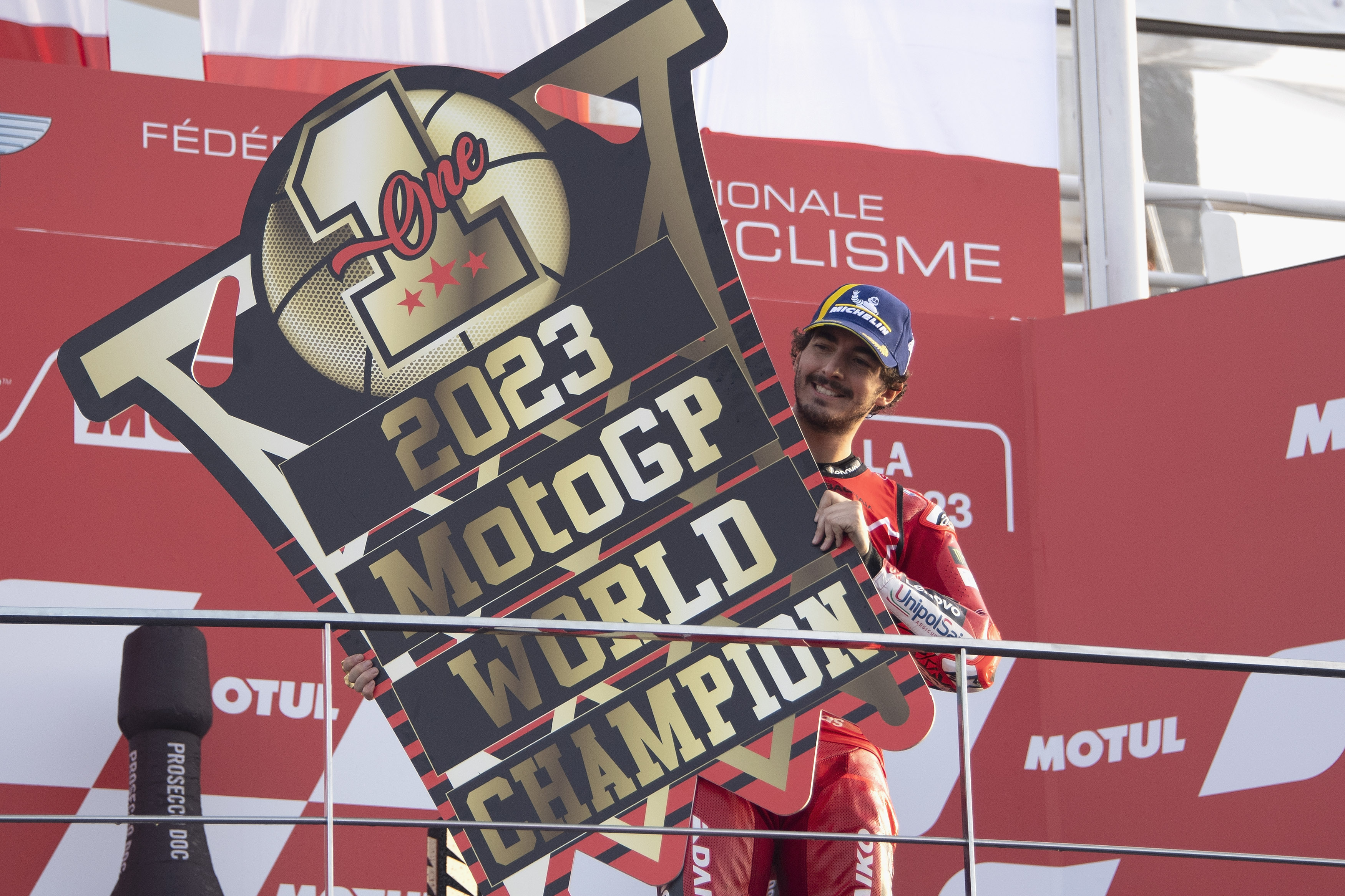 Rider celebrates victory in MotoGP race at Valencia.