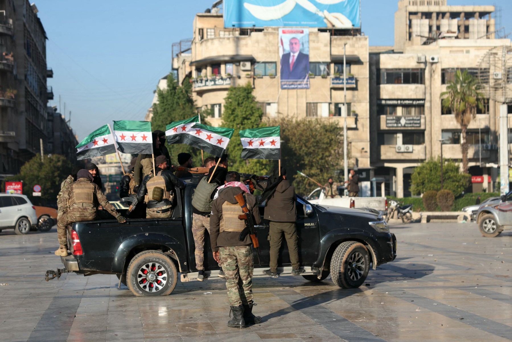 Syrian opposition fighters sweep into Aleppo