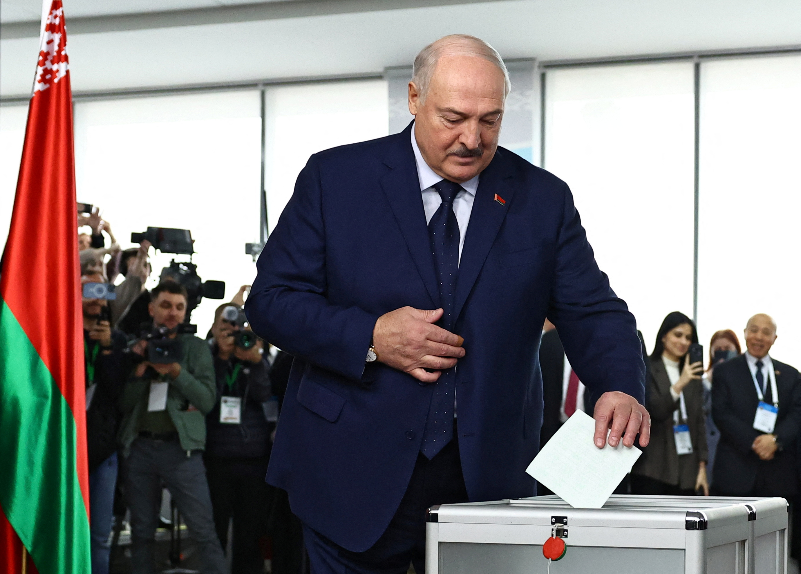 Belarusian President Alexander Lukashenko votes during the presidential election in Minsk