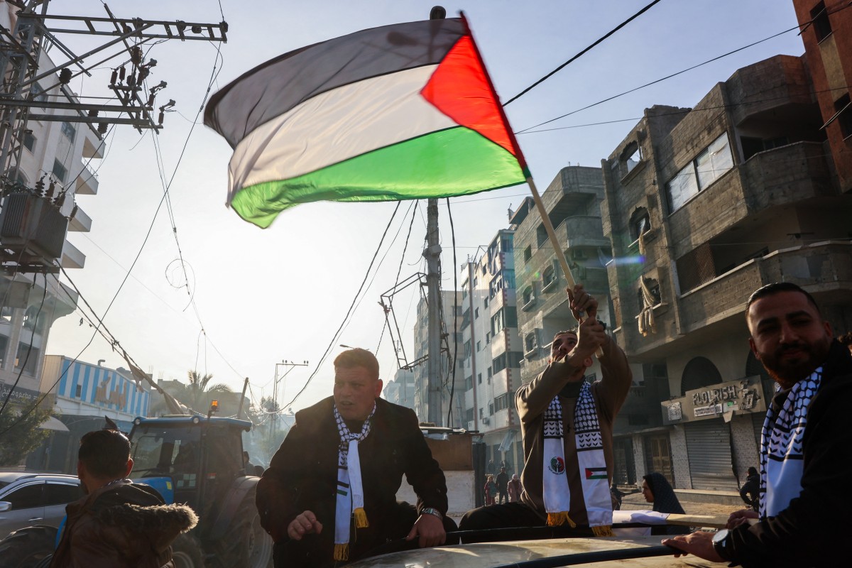 Palestinians celebrate the ceasefire announcement