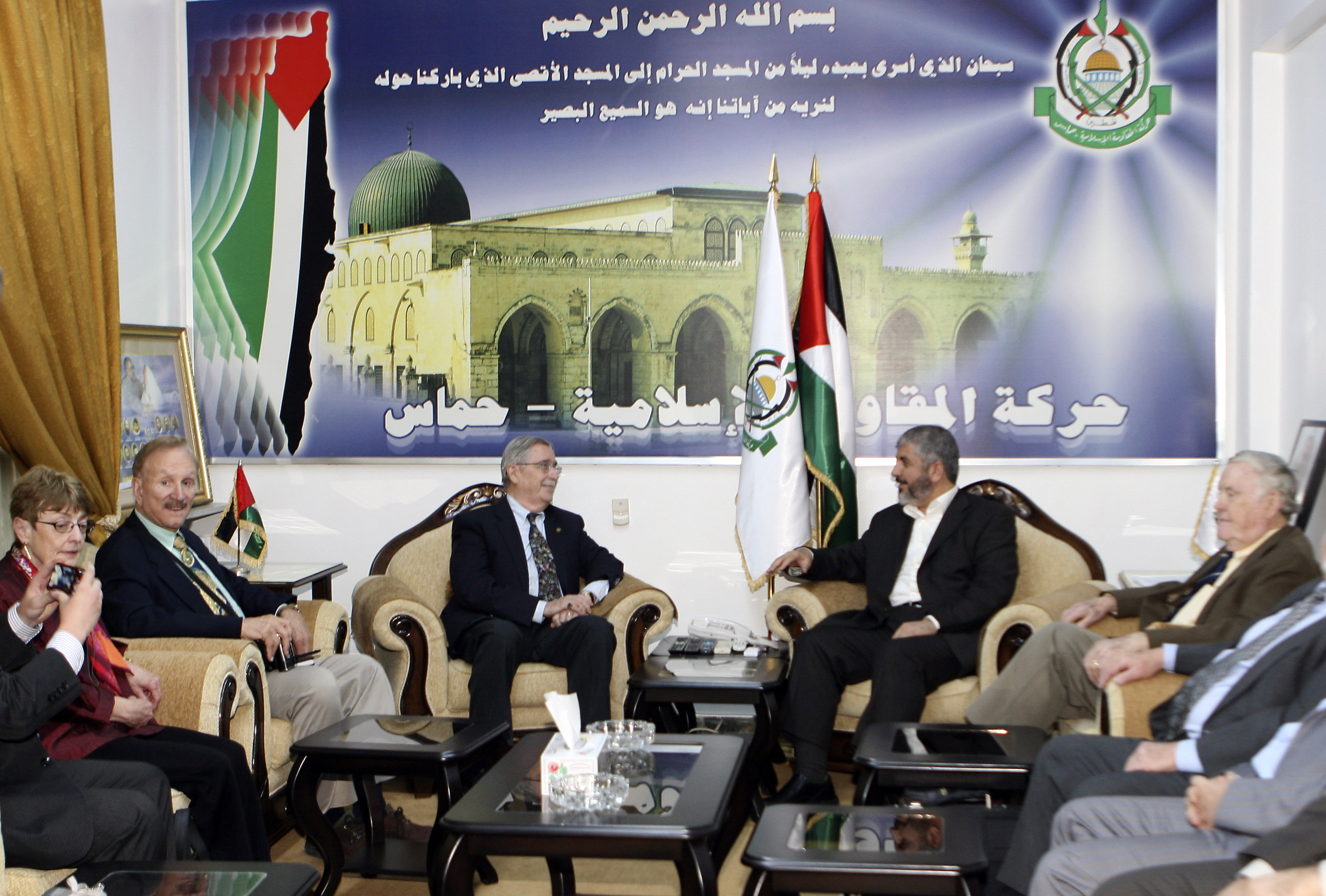 Khaled Mashaal, head of Hamas political bureau, right, meets with a non-governmental U.S. delegation, headed by David Newton, 3rd right, who held the post of the U.S. ambassador in a number of Arab countries, in Damascus, Syria on Saturday, May 29, 2010. Others unidentified. (AP Photo/ Bassem Tellawi).